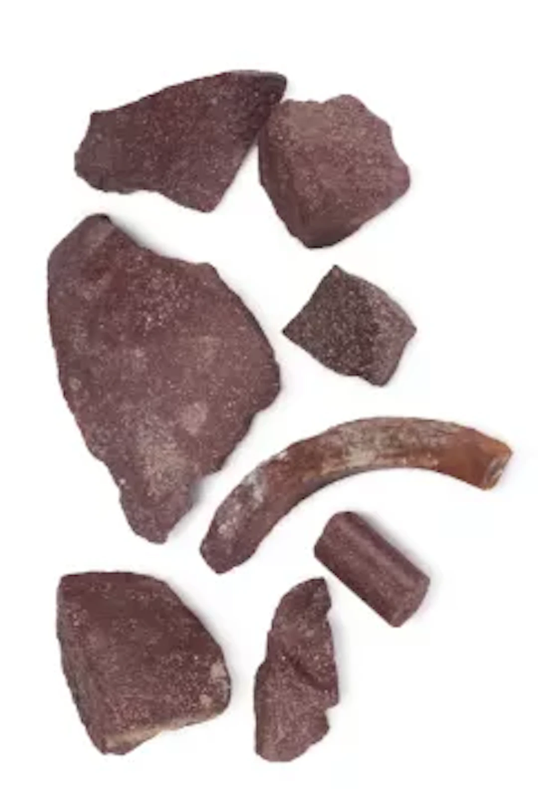 A COLLECTION OF IMPERIAL PORPHYRY FRAGMENTS, ROMAN, 1ST-3RD CENTURY A.D.