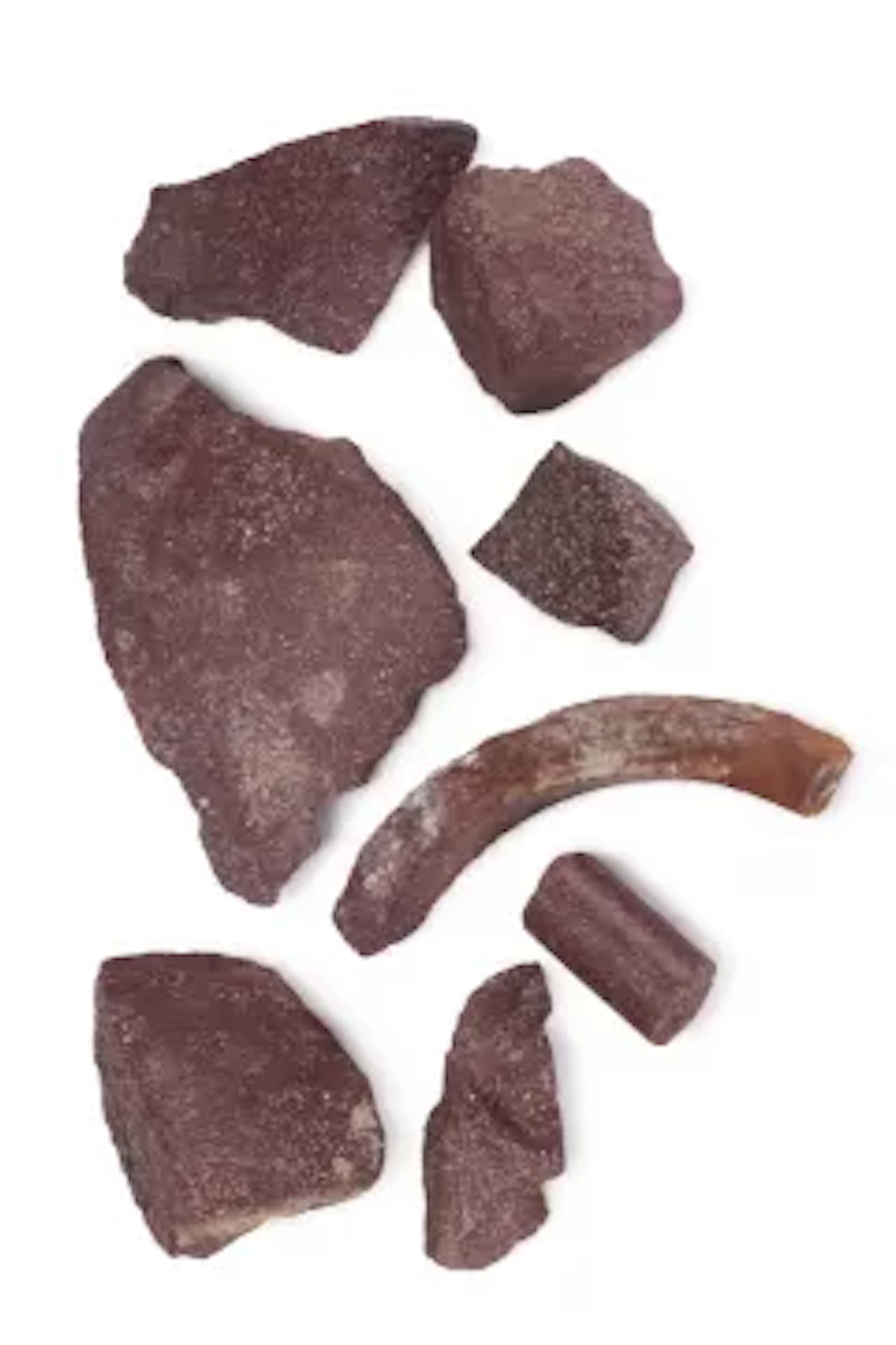A COLLECTION OF IMPERIAL PORPHYRY FRAGMENTS, ROMAN, 1ST-3RD CENTURY A.D.