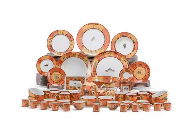 HERMES PARIS, AFRICA ORANGE, A PORCELAIN PART DINNER SERVICE