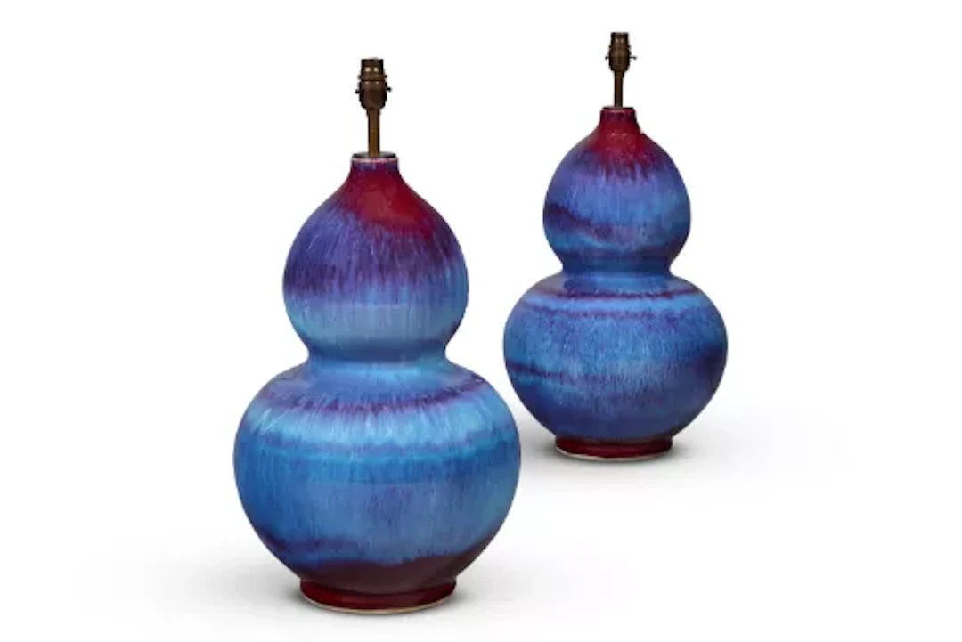 A PAIR OF CHINESE-STYLE MOTTLED-BLUE AND SANG DE BOEUF GLAZED DOUBLE-GOURD