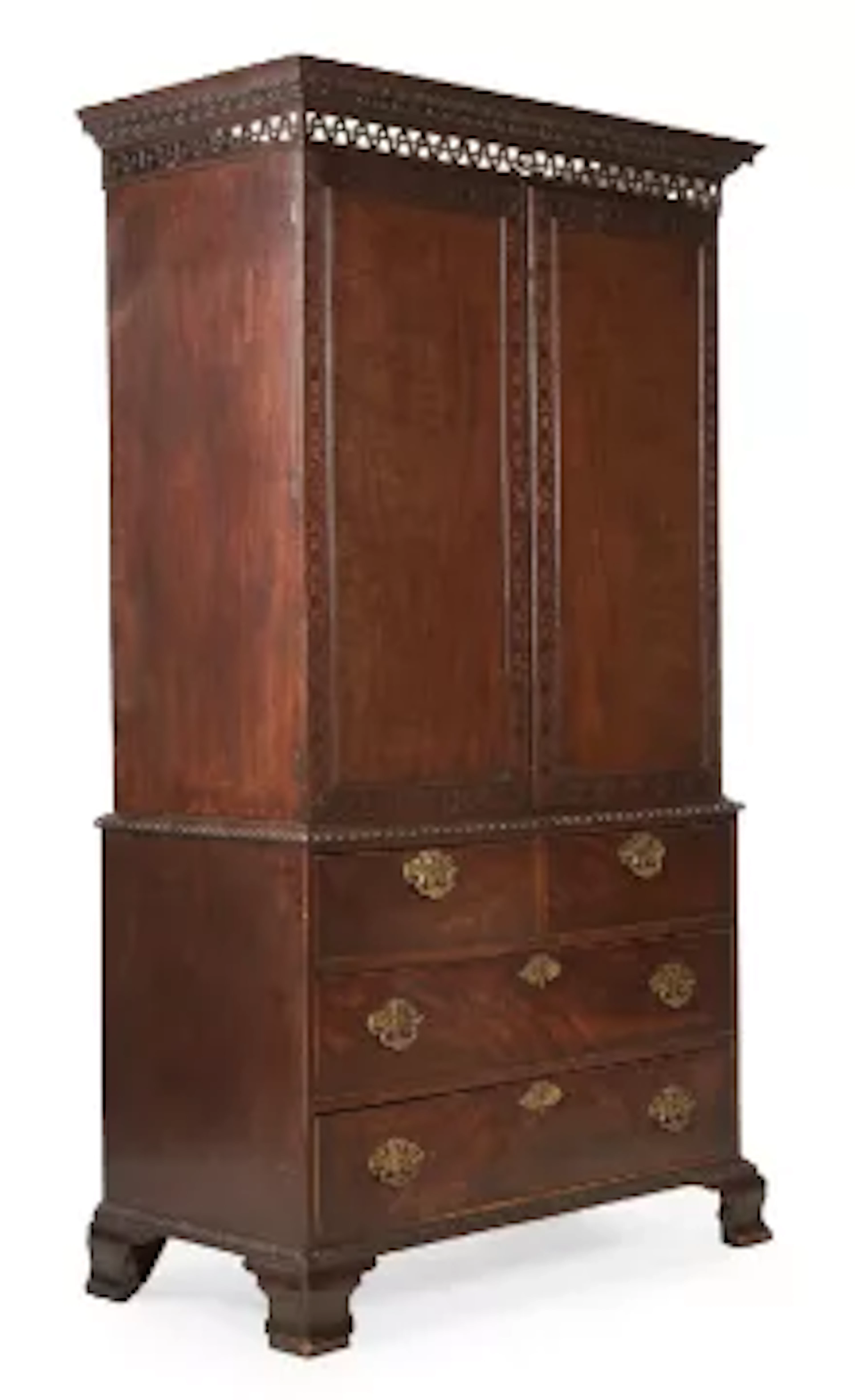 A FINE GEORGE III MAHOGANY AND FRET CARVED LINEN PRESS, CIRCA 1770