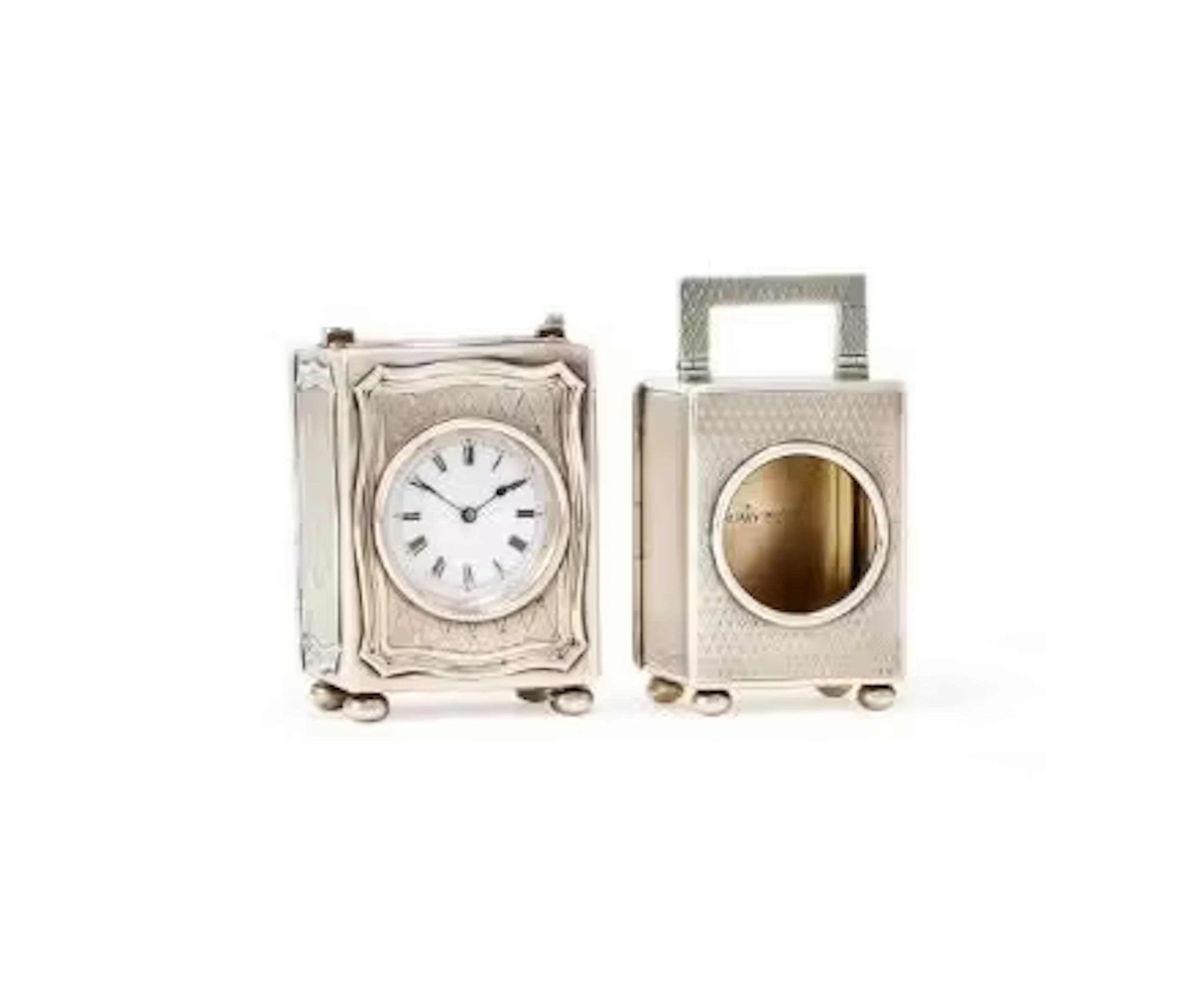 AN EDWARDIAN SILVER MINIATURE CARRIAGE TIMEPIECE
