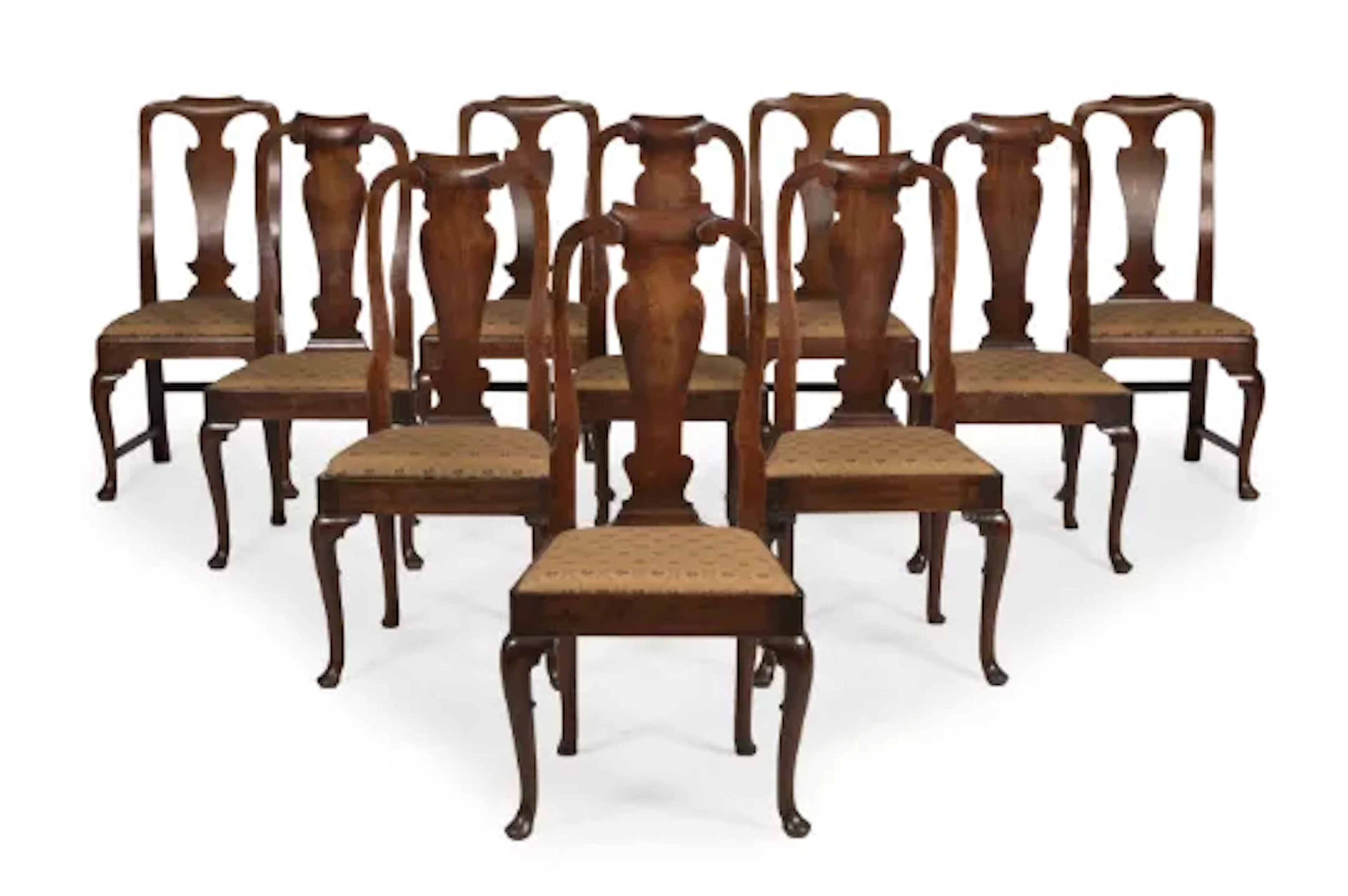 A MATCHED SET OF TEN GEORGE II 'RED WALNUT' SIDE CHAIRS, CIRCA 1730