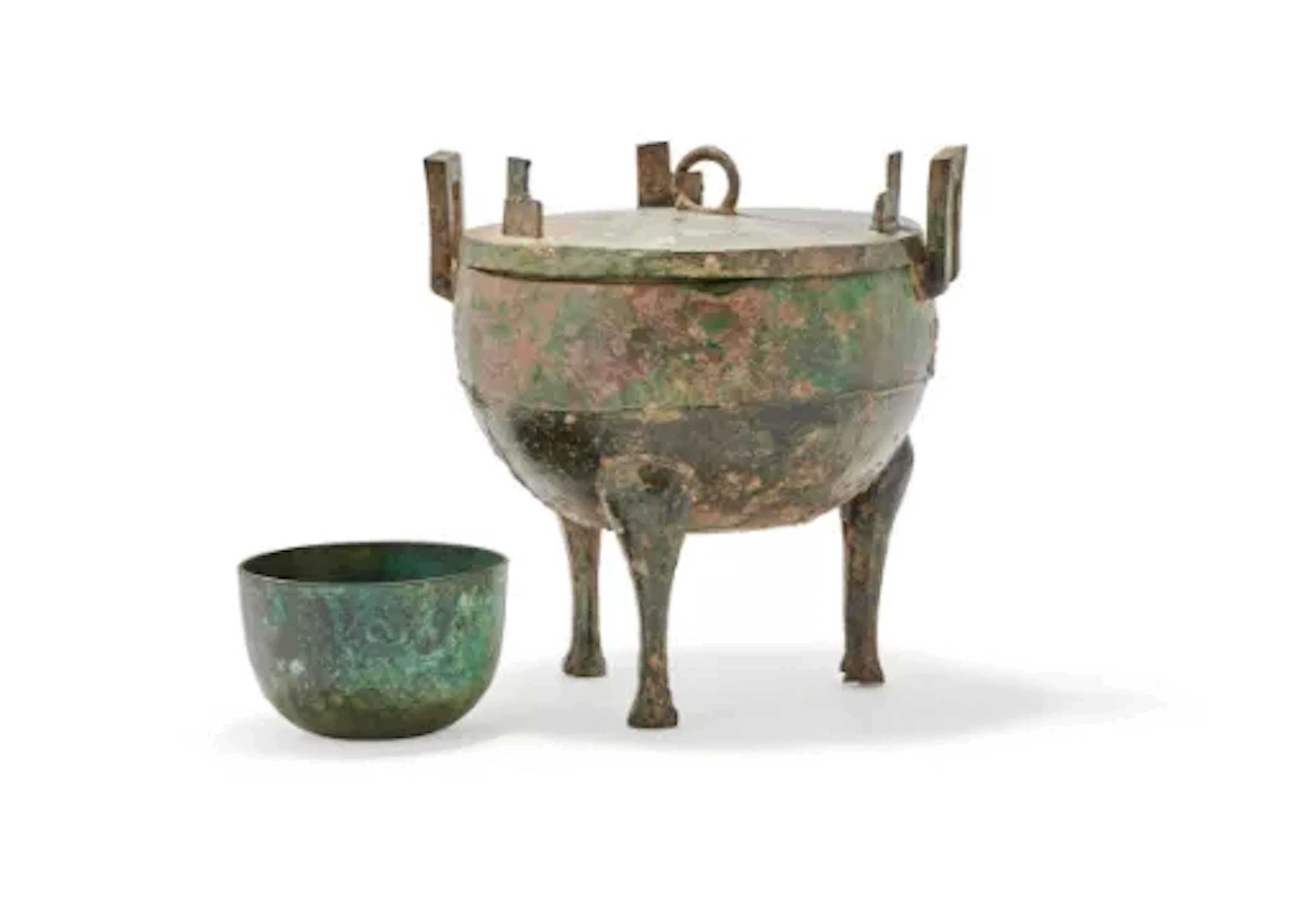 A Chinese bronze ding ritual tripod food vessel and cover, presumed