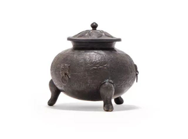 A Chinese silver 'mythical beasts' tripod jar and cover, Possibly Tang dynasty