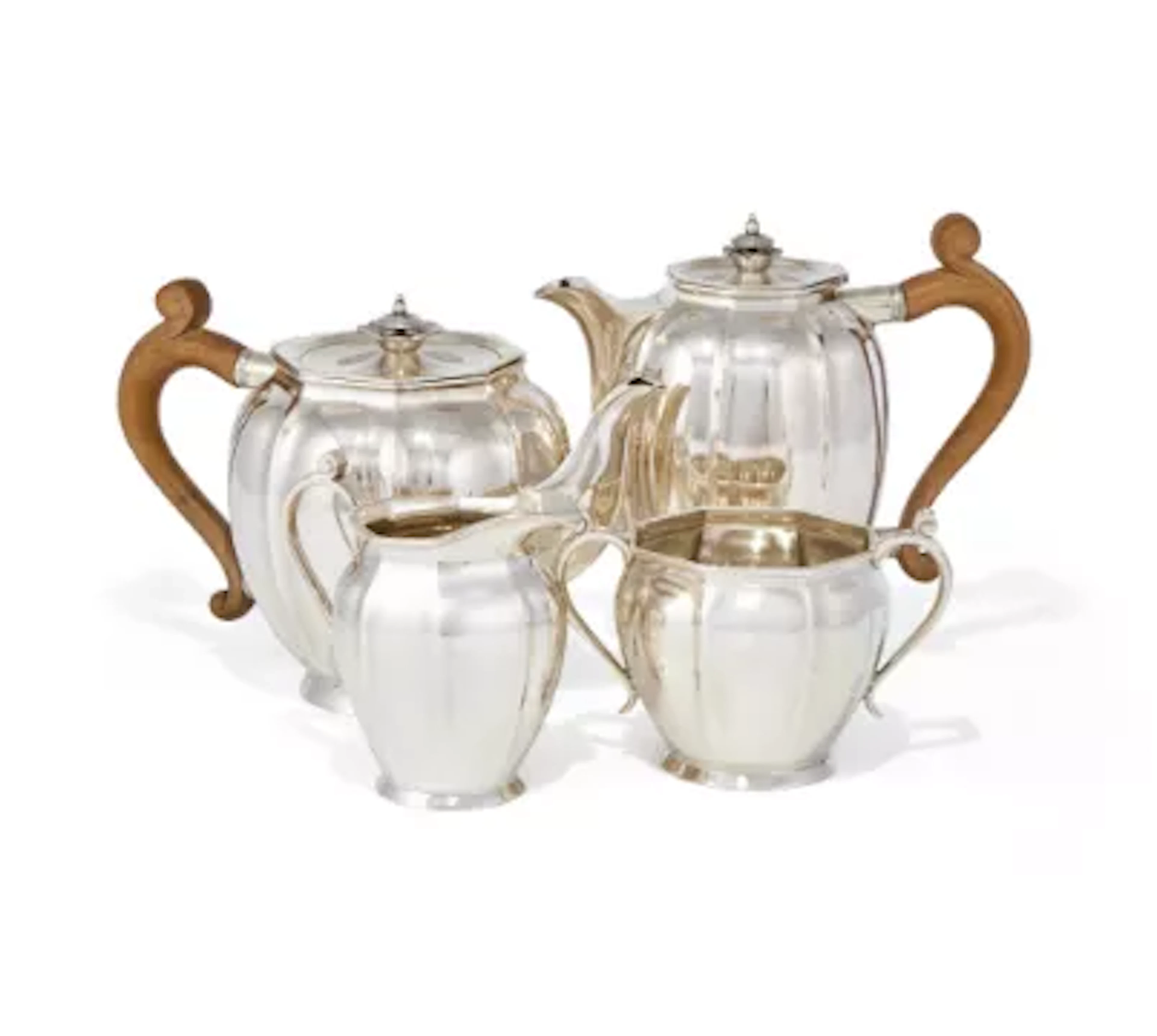 A SILVER FOUR PIECE LOBED CIRCULAR TEA SET, ROBERTS & BELK LTD., SHEFFIELD 1948