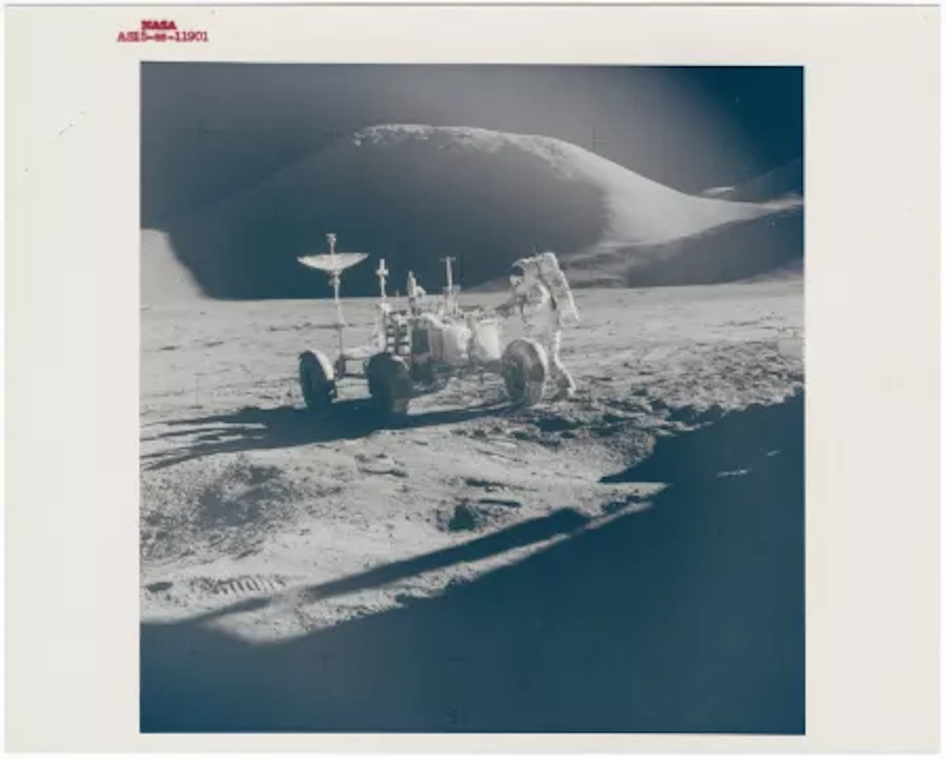 [Apollo 15] PORTRAIT OF JAMES IRWIN AND THE LUNAR ROVER IN FRONT OF