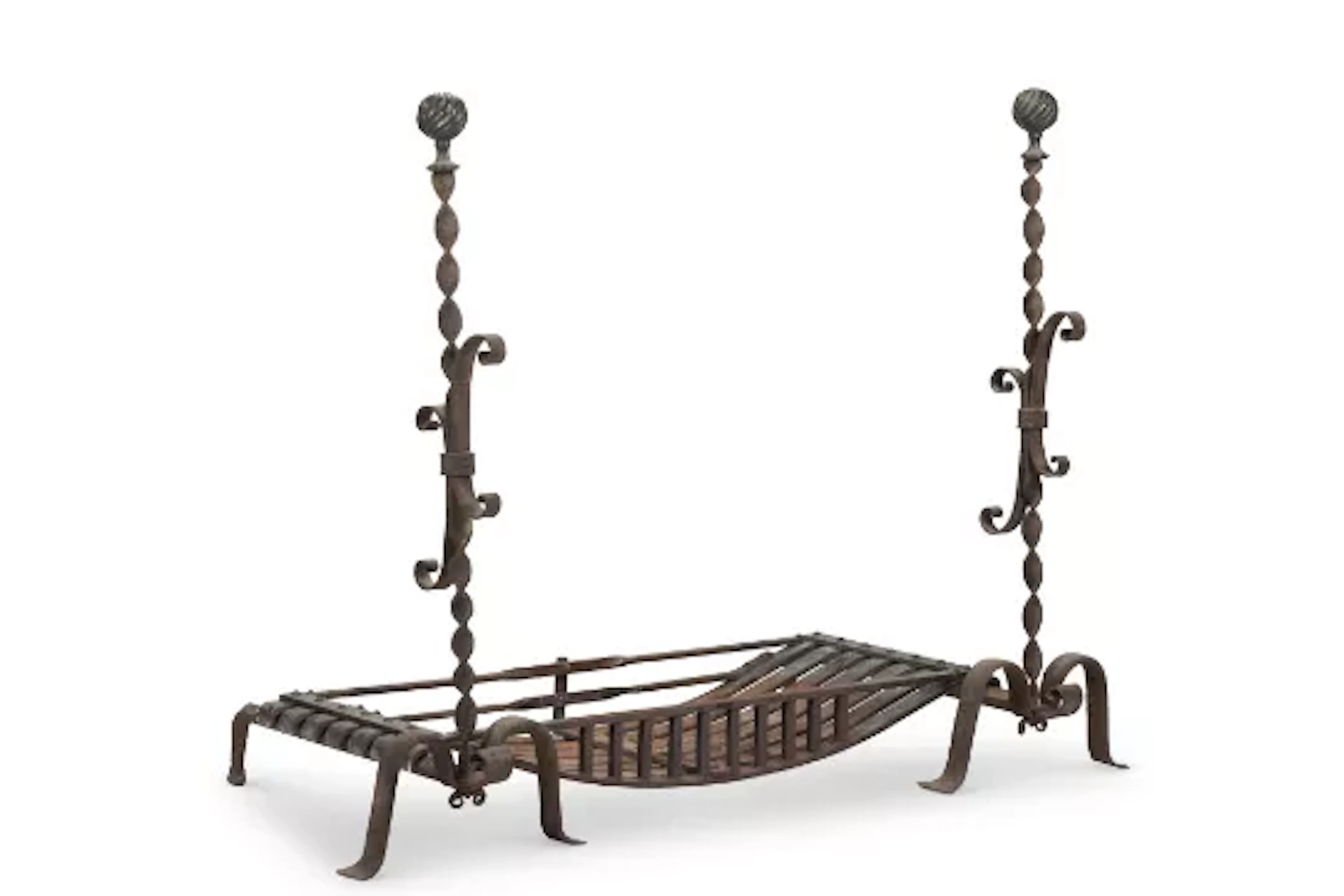 A PAIR OF IRON AND BRASS FIREDOGS WITH A LATER SUSPENDED GRATE, PROBABLY