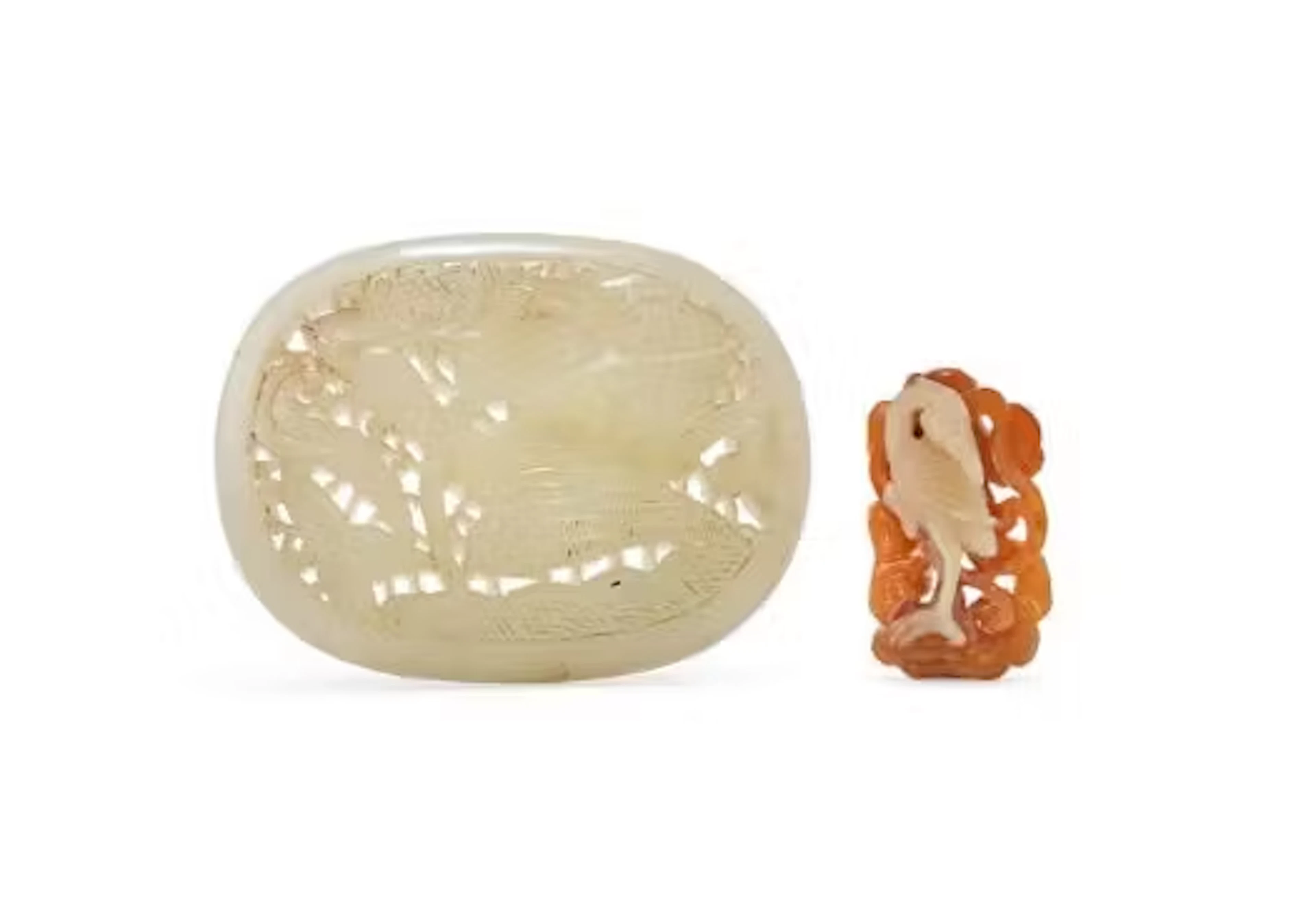 A Chinese pale celadon jade 'Lotus and goose' belt plaque