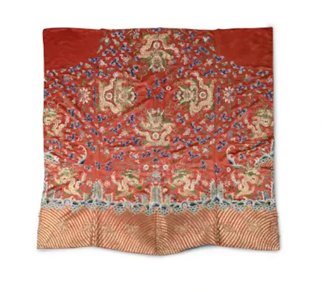 A Chinese coral-red satin silk unmade dragon jacket, Late 19th century