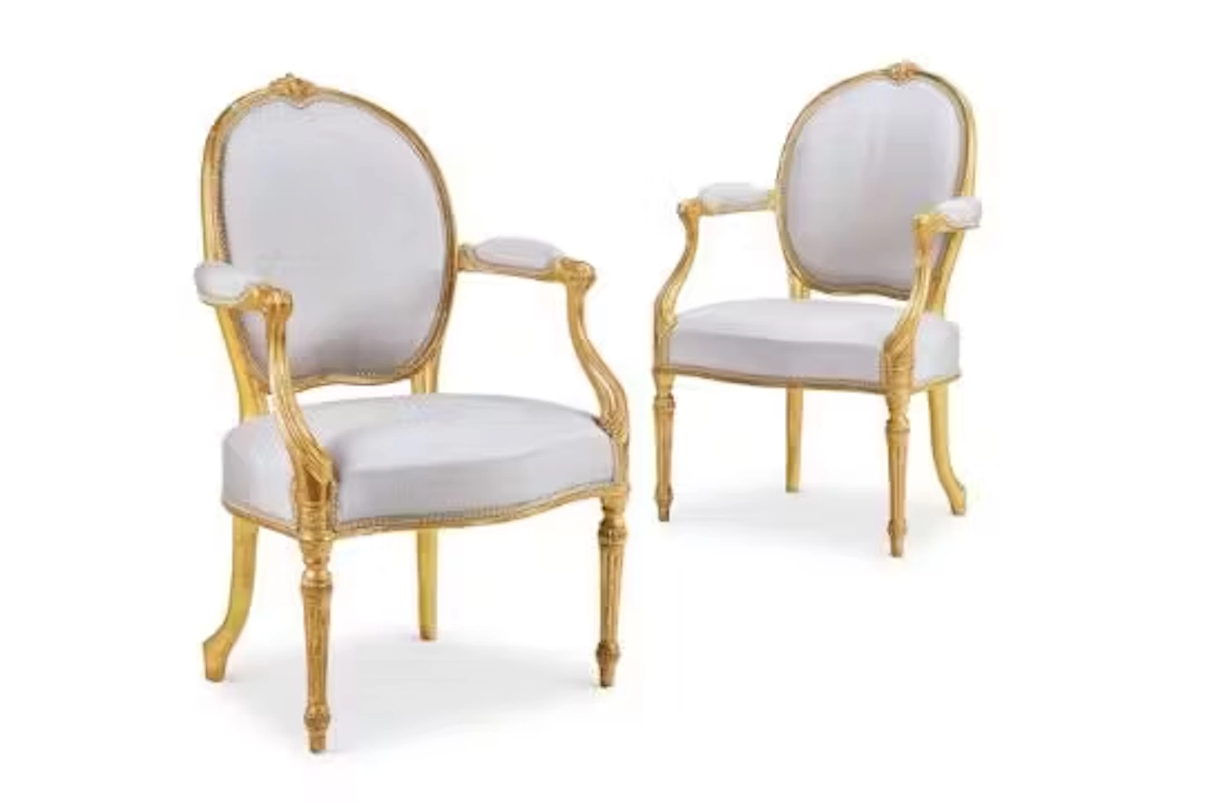 ‡ A PAIR OF GEORGE III GILTWOOD ARMCHAIRS, CIRCA 1775
