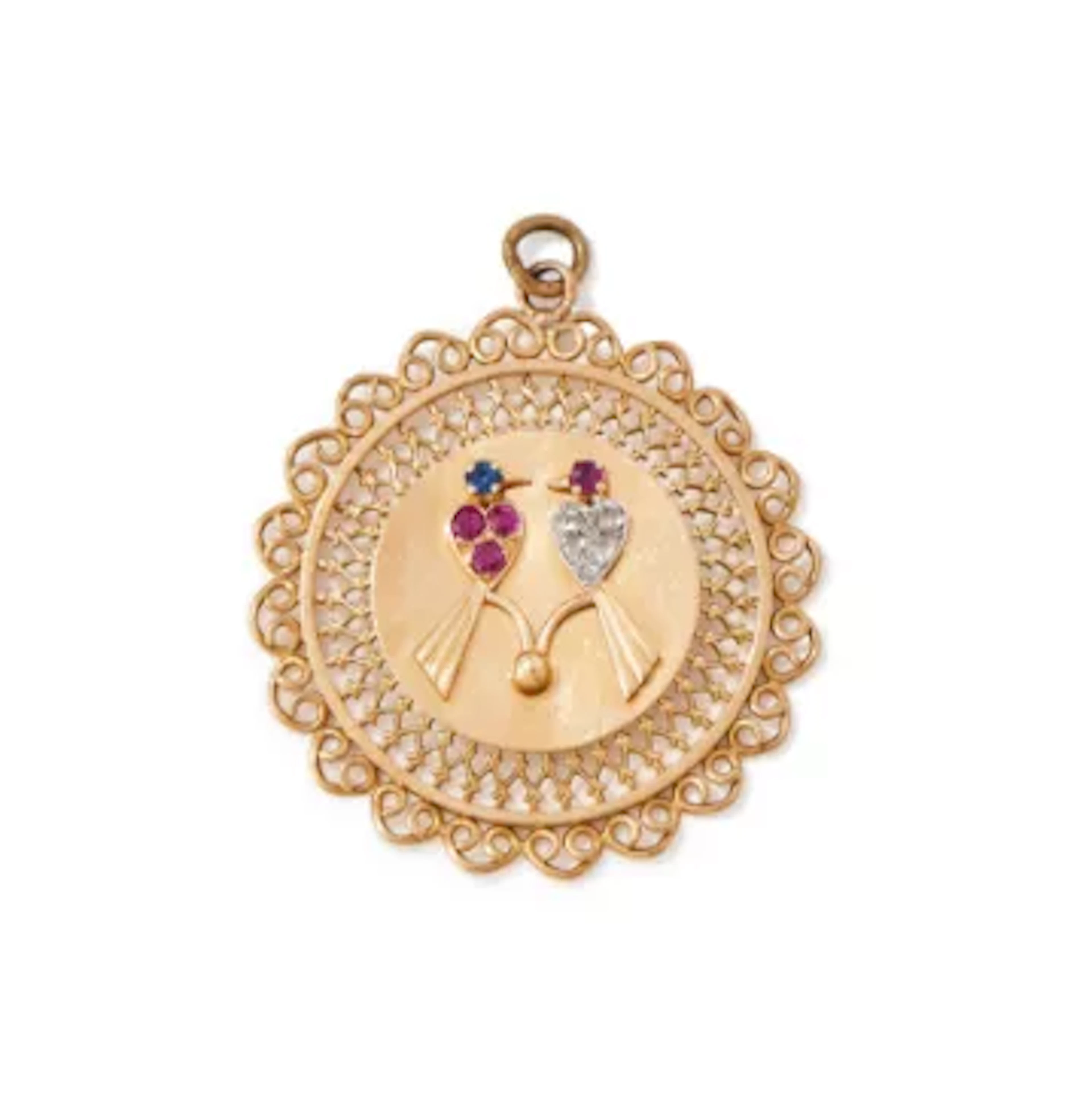 A 1960S FRENCH GEM SET DISC CHARM