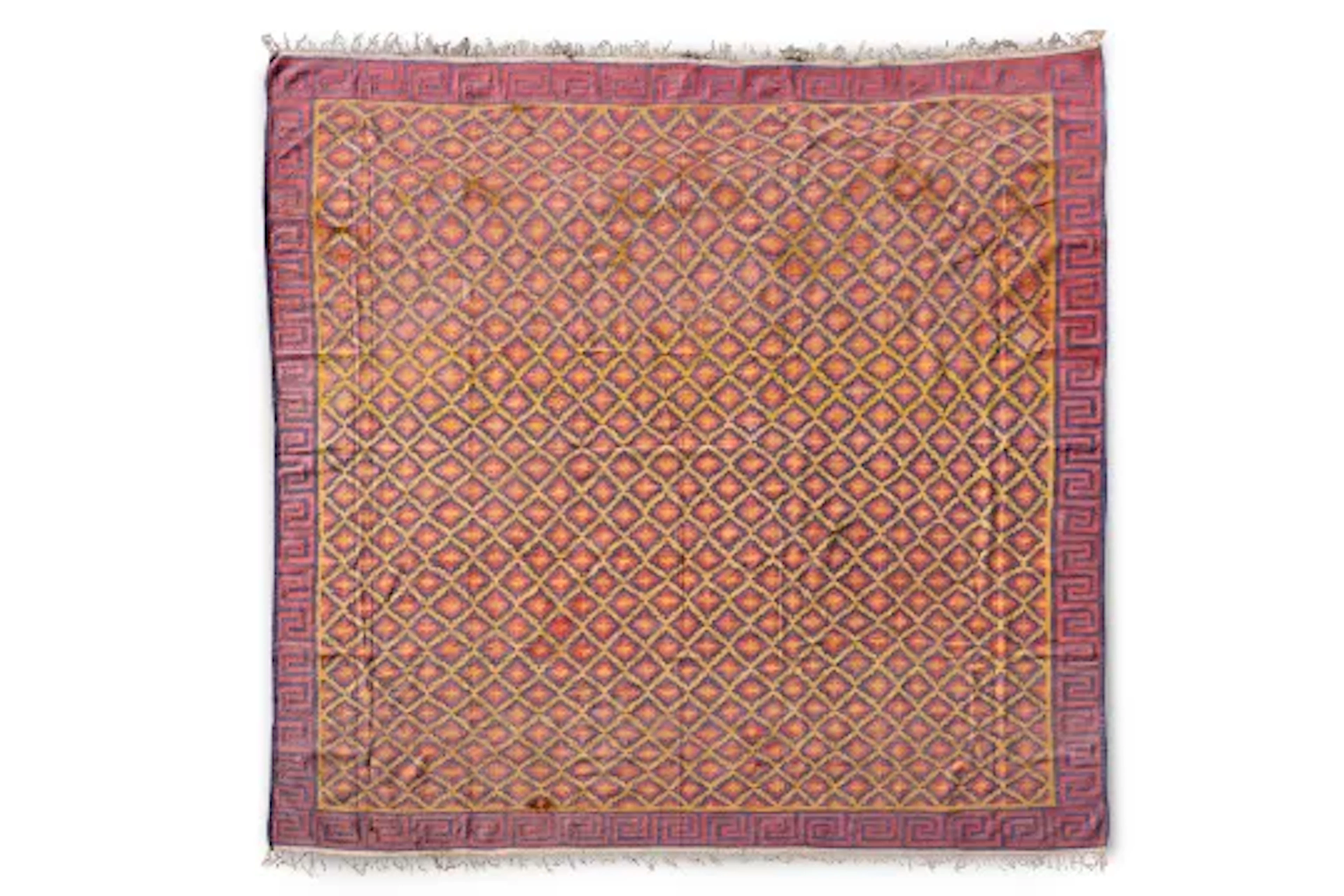 AN ORANGE, RED AND BLUE DHURRIE, CIRCA 1900