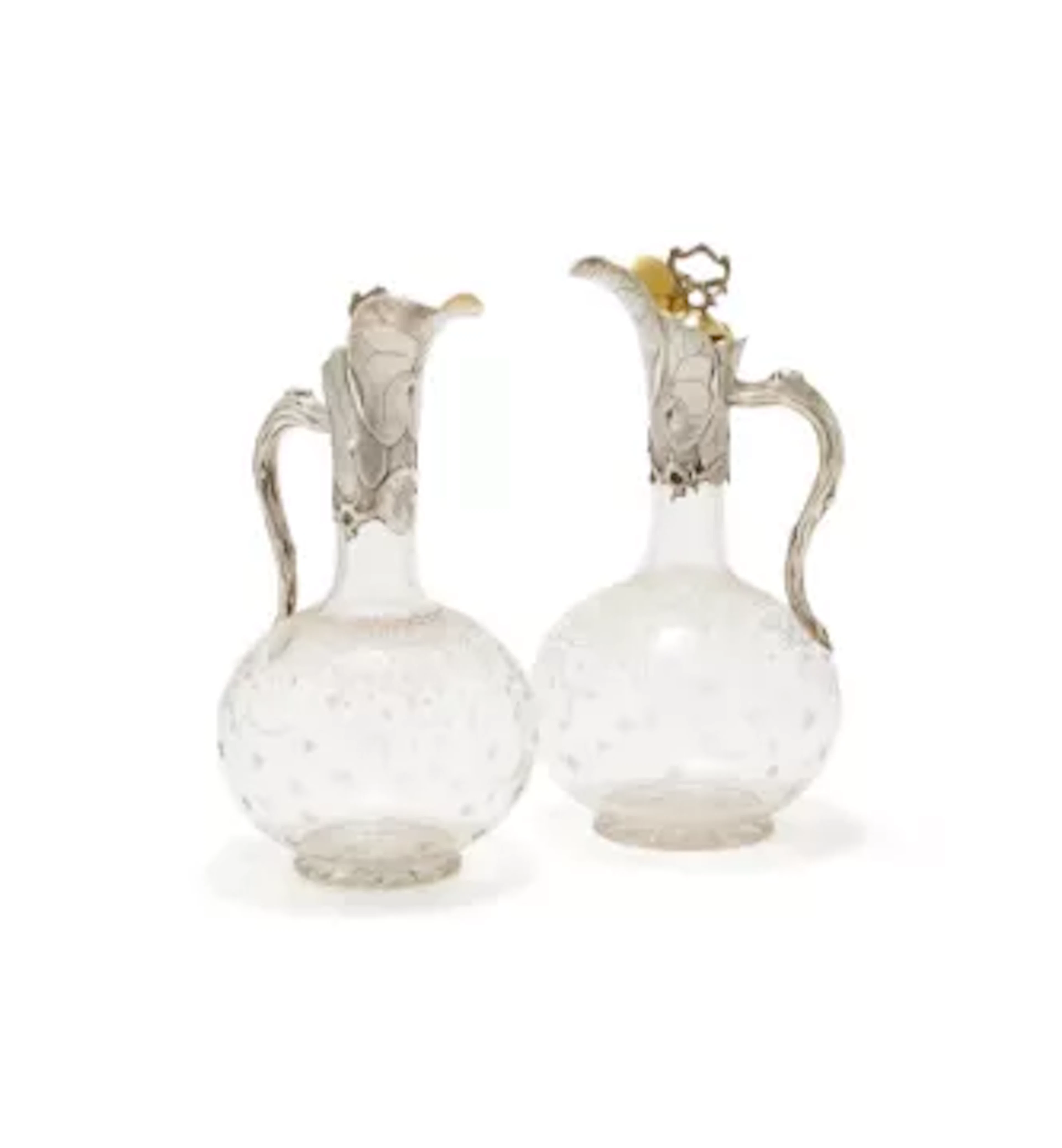A PAIR OF VICTORIAN SILVER MOUNTED AND GLASS CLARET JUGS, GEORGE FOX
