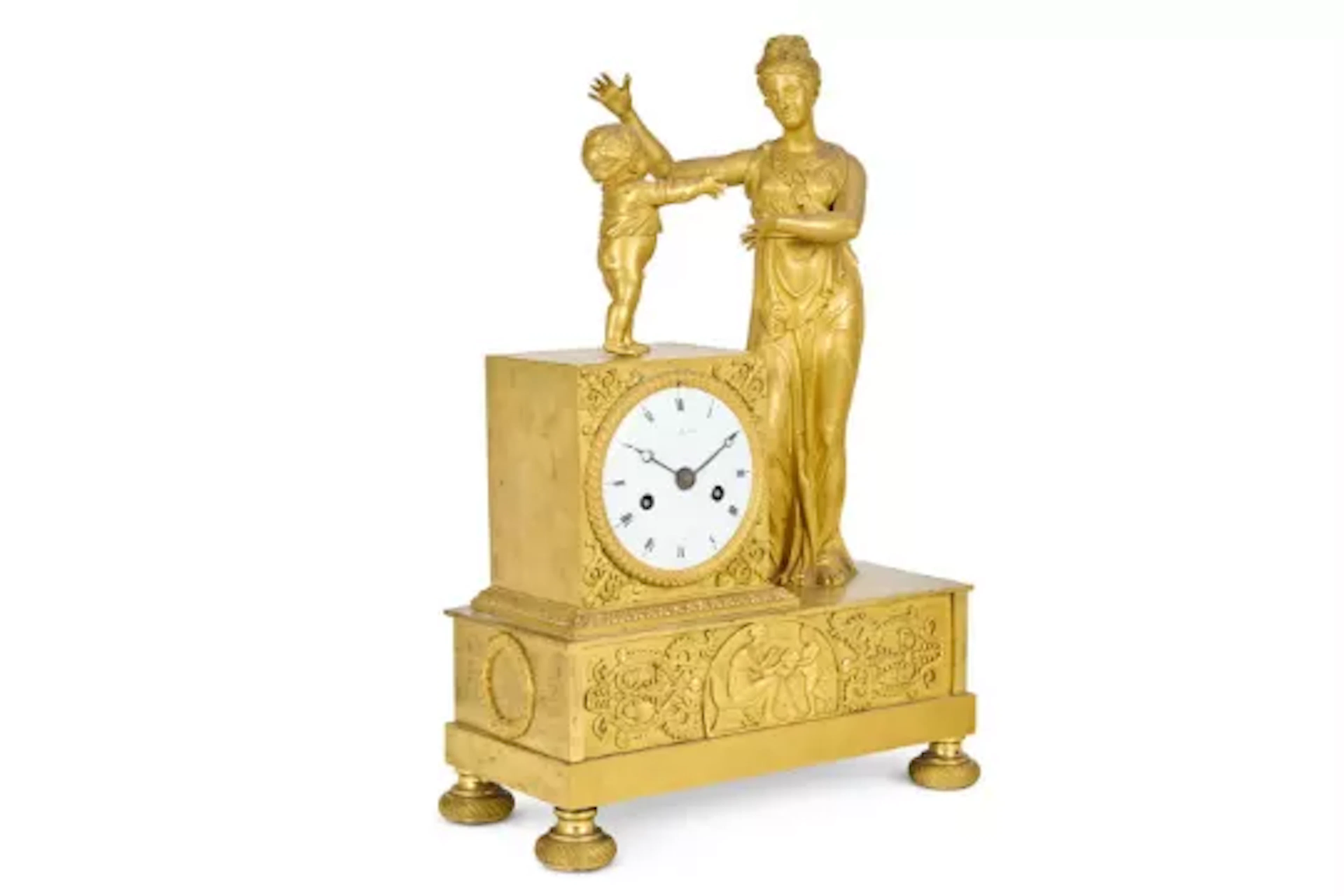 A FRENCH EMPIRE GILT BRONZE FIGURAL MANTEL CLOCK, LOUIS MALLET PARIS