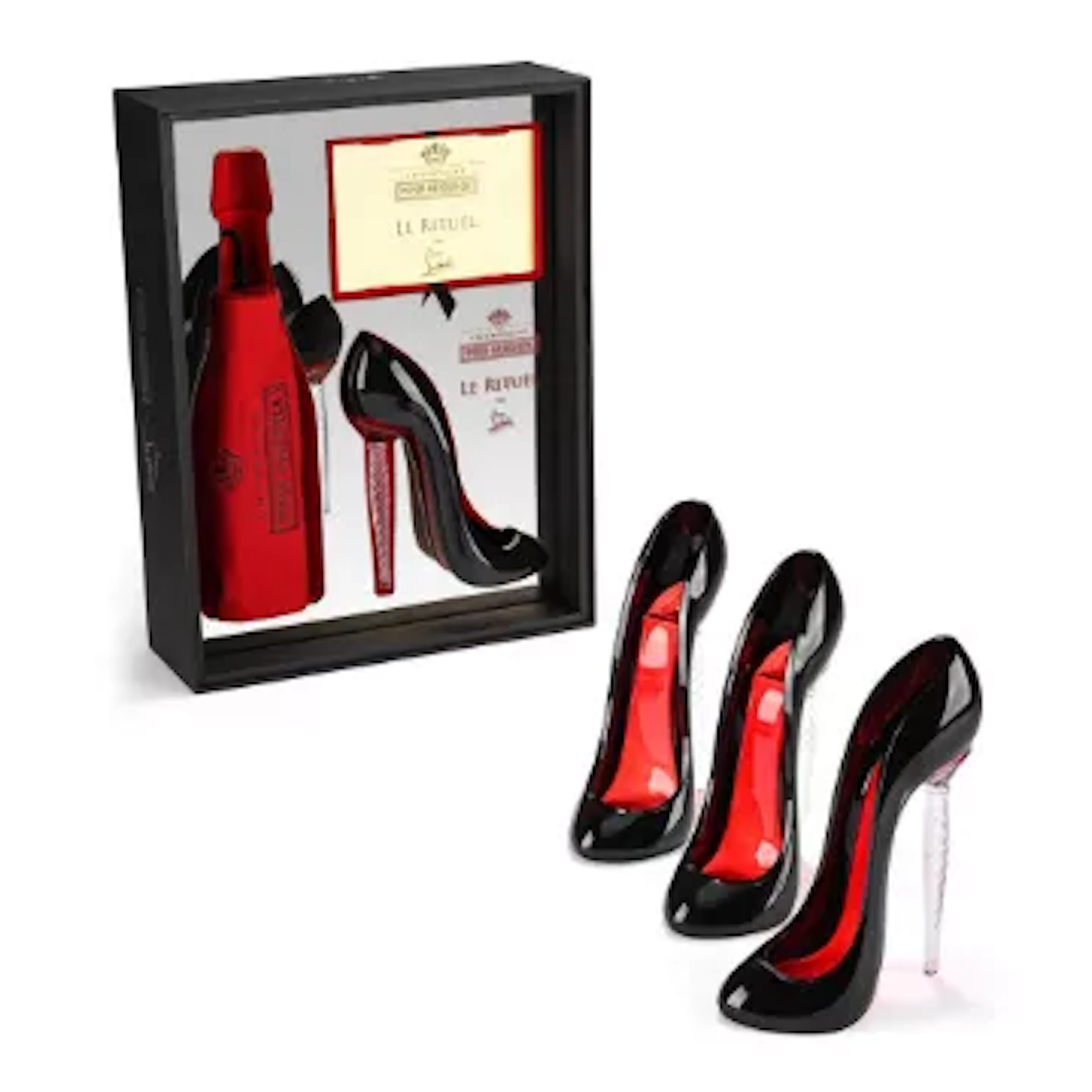 CHRISTIAN LOUBOUTIN, FOUR RED CHAMPAGNE CRYSTAL STILETTO FLUTES, CONTEMPORARY