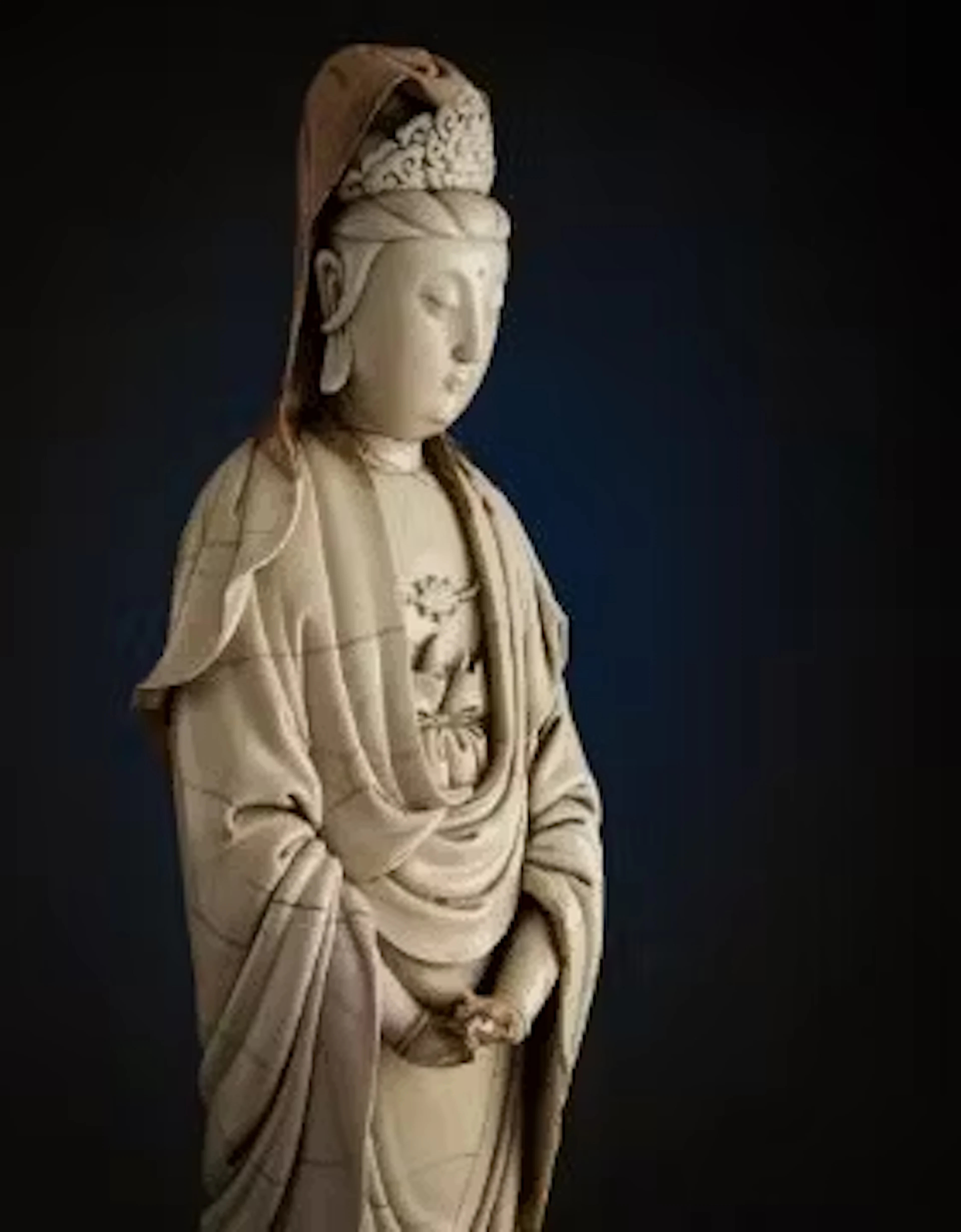 A large and rare Chinese dehua standing figure of guanyin