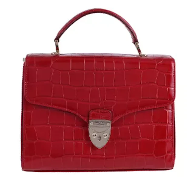 Y ASPINAL OF LONDON, A RED CROCODILE HANDBAG