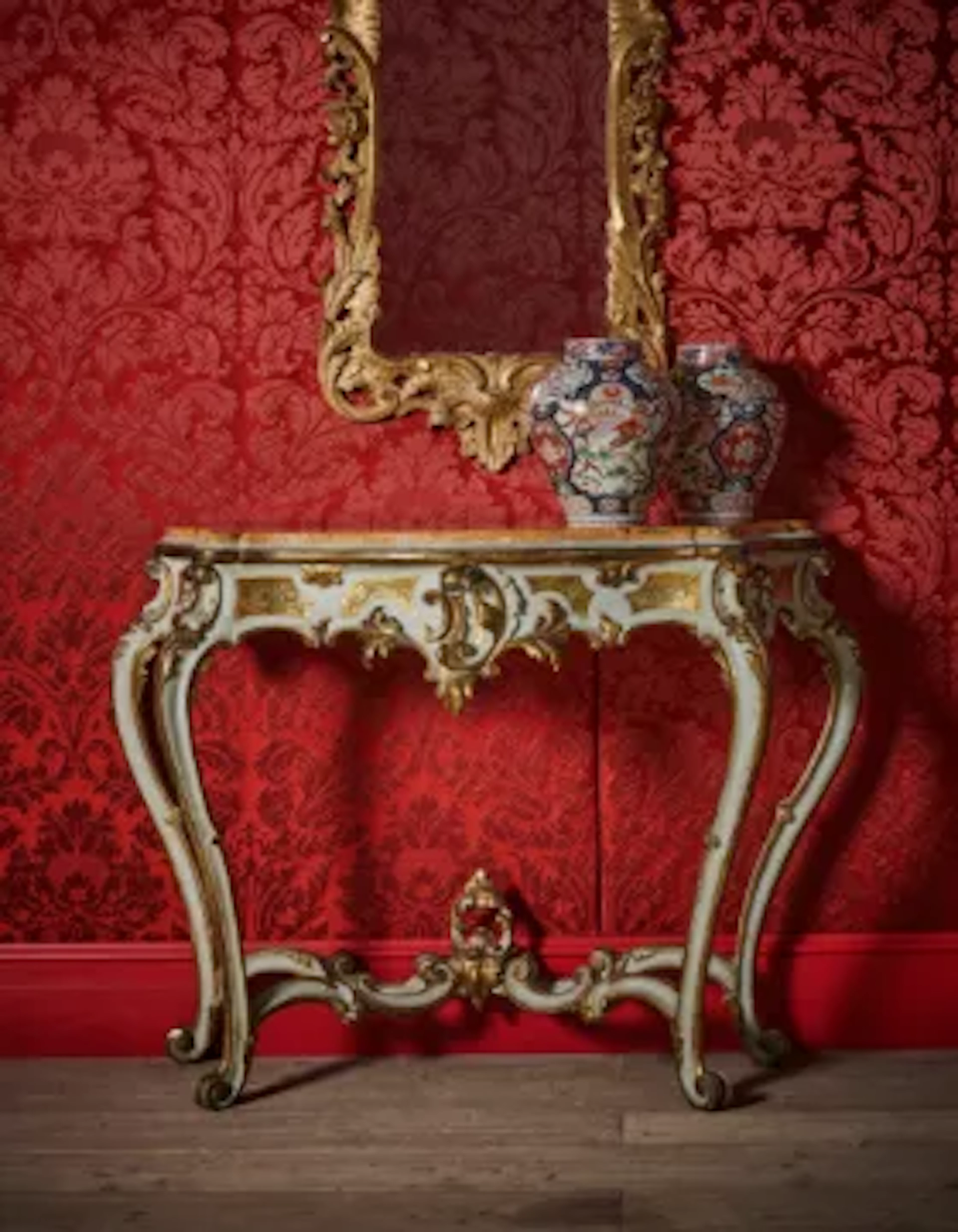 AN ITALIAN PAINTED AND PARCEL GILT CONSOLE OR SIDE TABLE, LATE 18TH