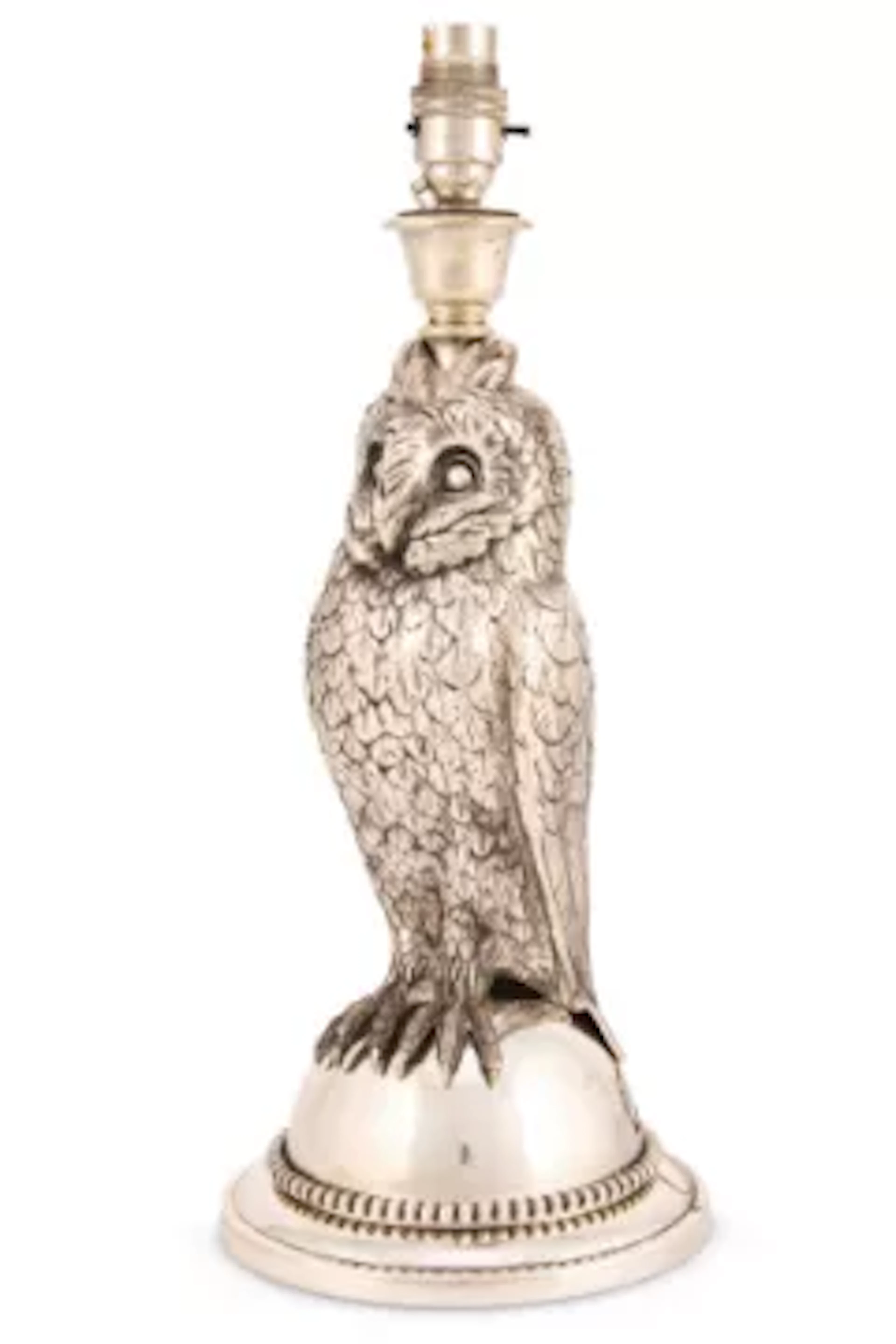 A SILVERED BRASS TABLE LIGHT OF OWL FORM, EARLY 20TH CENTURY
