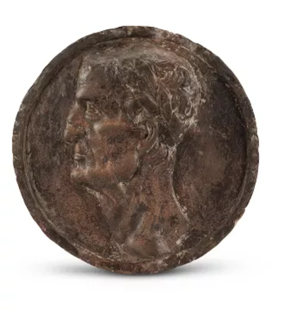AFTER THE ANTIQUE- A TERRACOTTA PORTRAIT ROUNDEL OF AN EMPEROR, NORTH