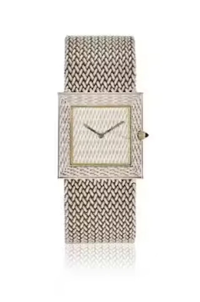 BOUCHERON, AN 18 CARAT WHITE GOLD BRACELET WATCH