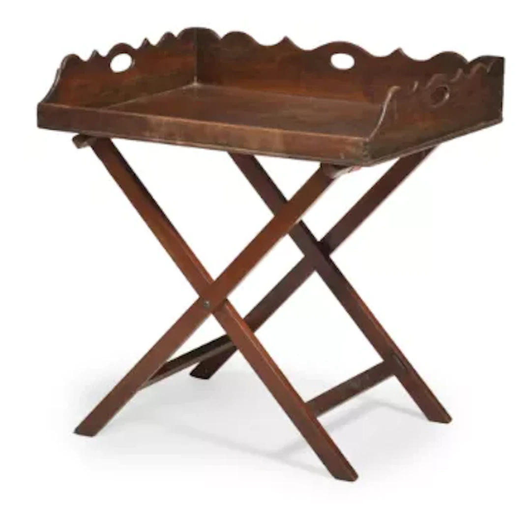 A MAHOGANY BUTLER’S TRAY ON AN X-FRAME STAND, CIRCA 1800