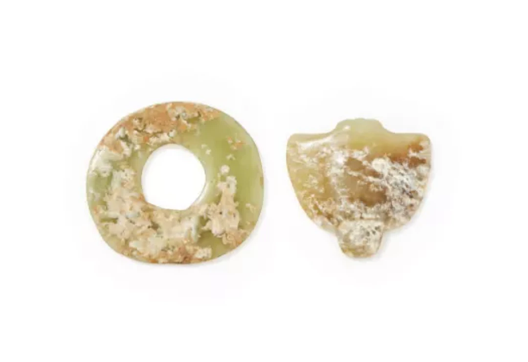 Two Chinese pale celadon pendants, Hongshan culture, circa 3000BC