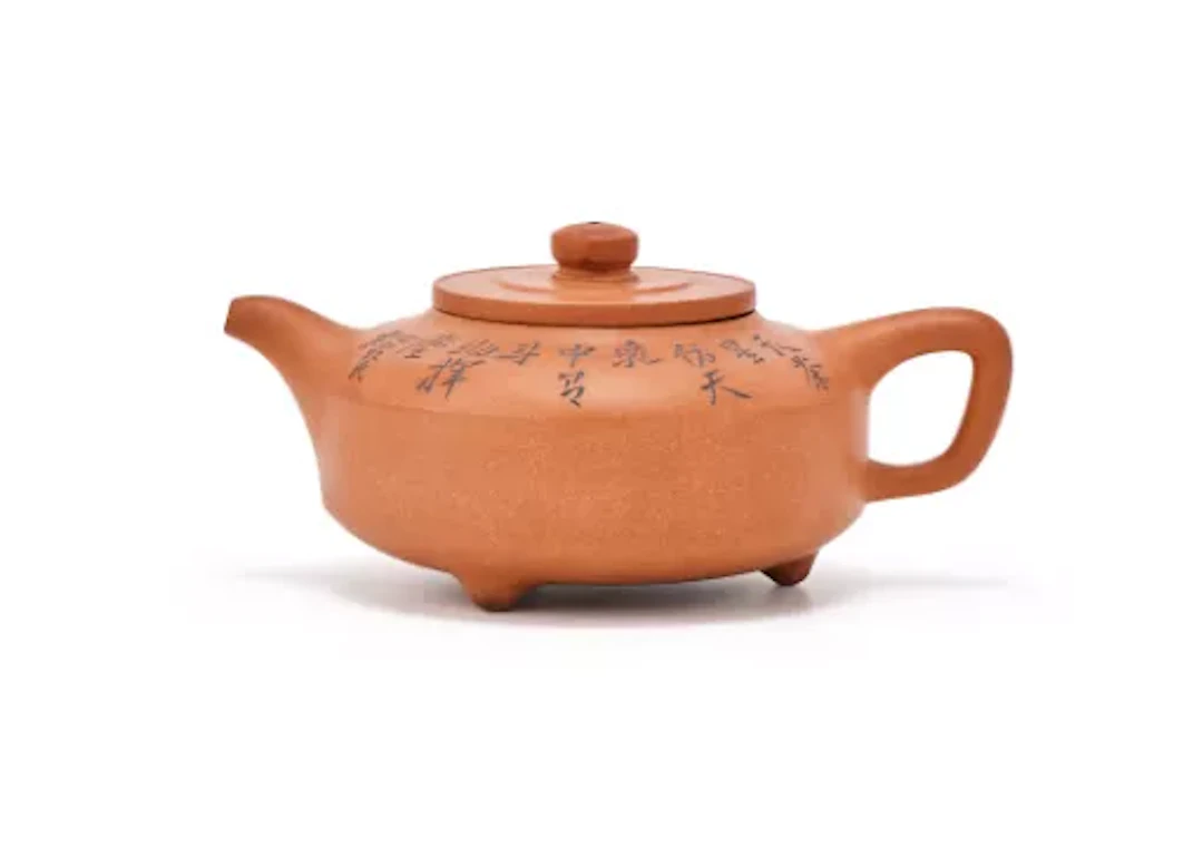 A Chinese yixing inscribed teapot, Qing Dynasty