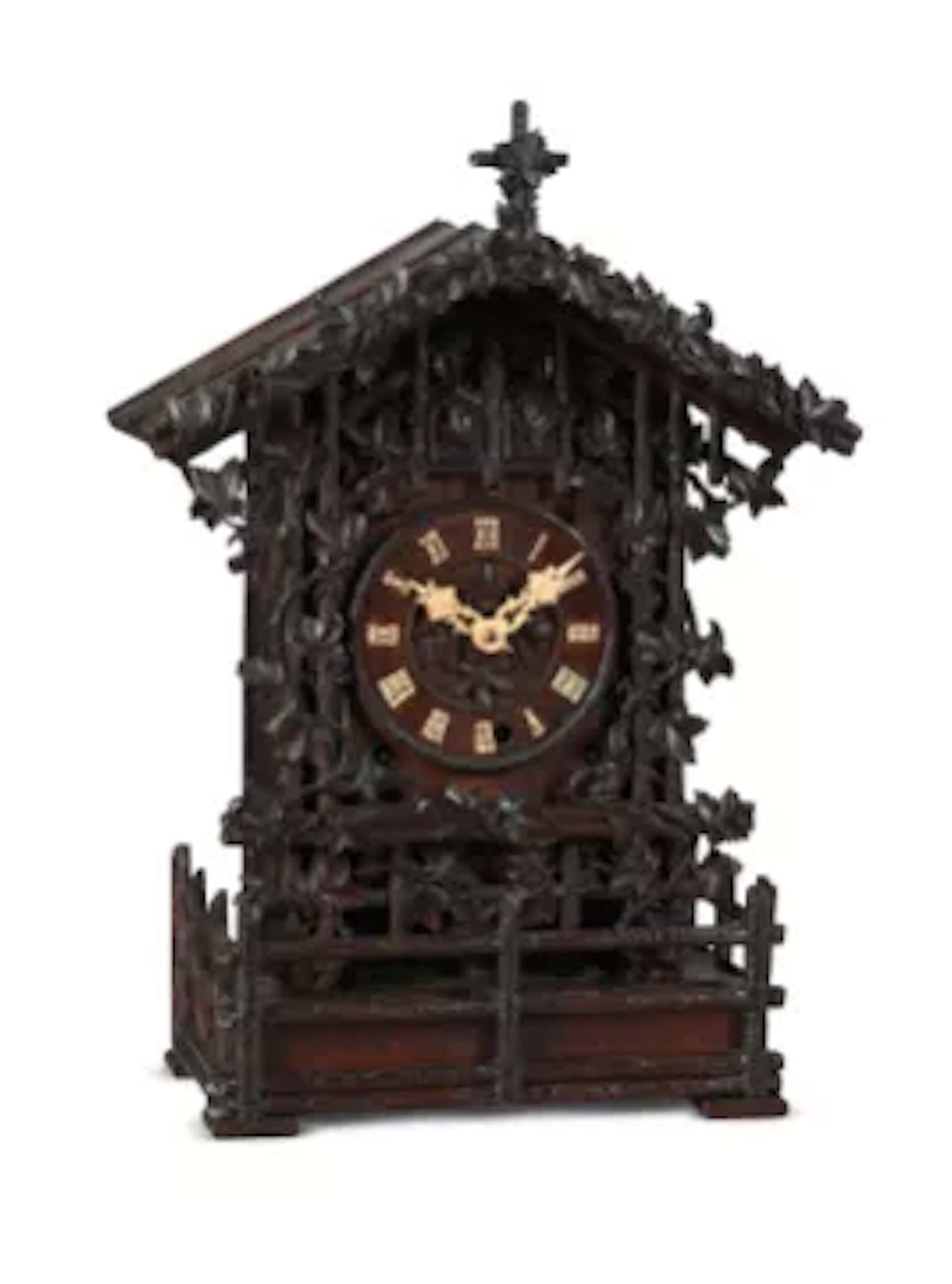 A RARE BLACK FOREST CARVED OAK QUARTER-STRIKING ‘CUCKOO AND QUAIL’ MANTEL CLOCK