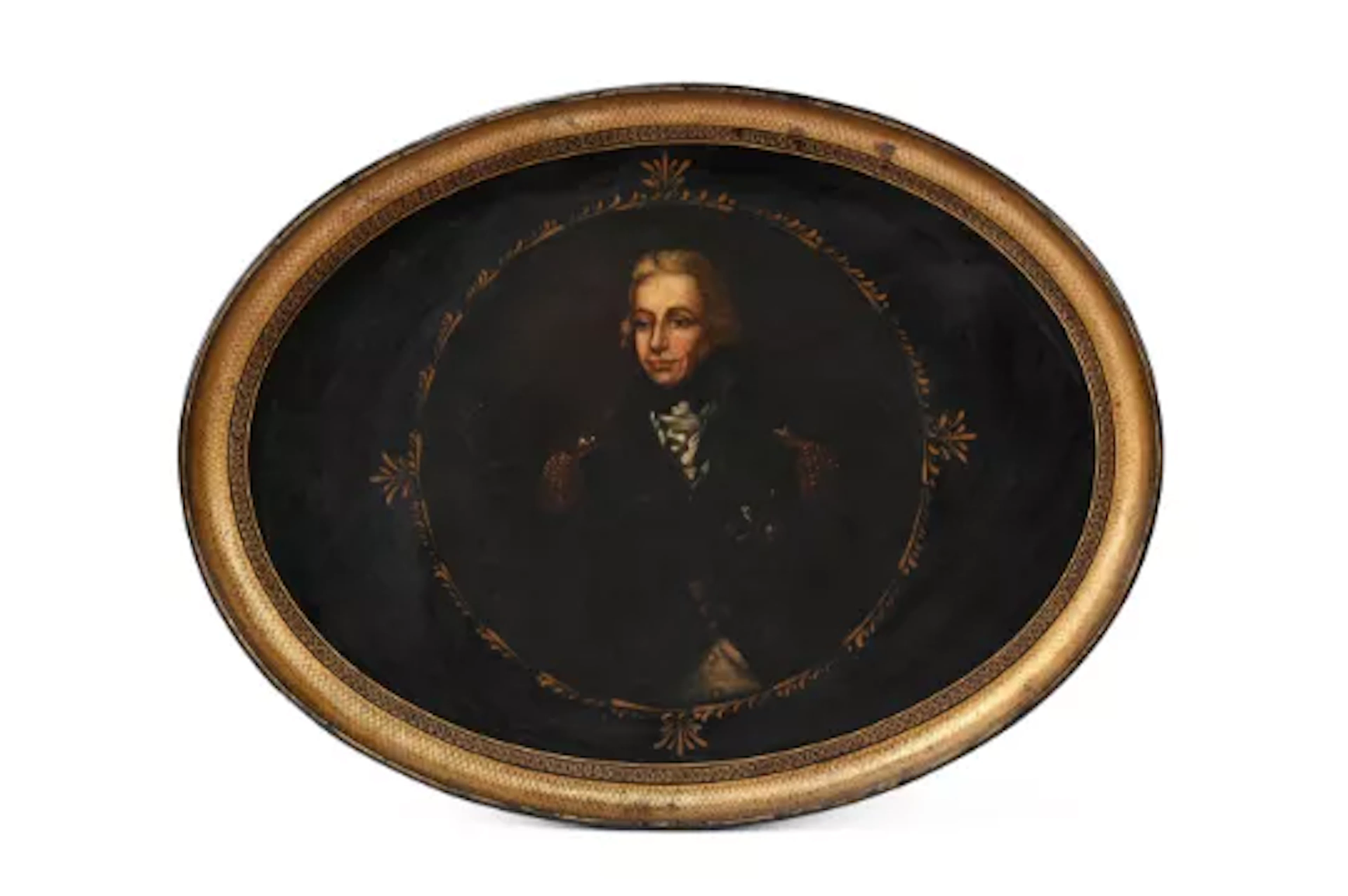 A REGENCY PAINTED AND PARCEL GILT PAPIER MÂCHÉ OVAL TRAY WITH A PORTRAIT