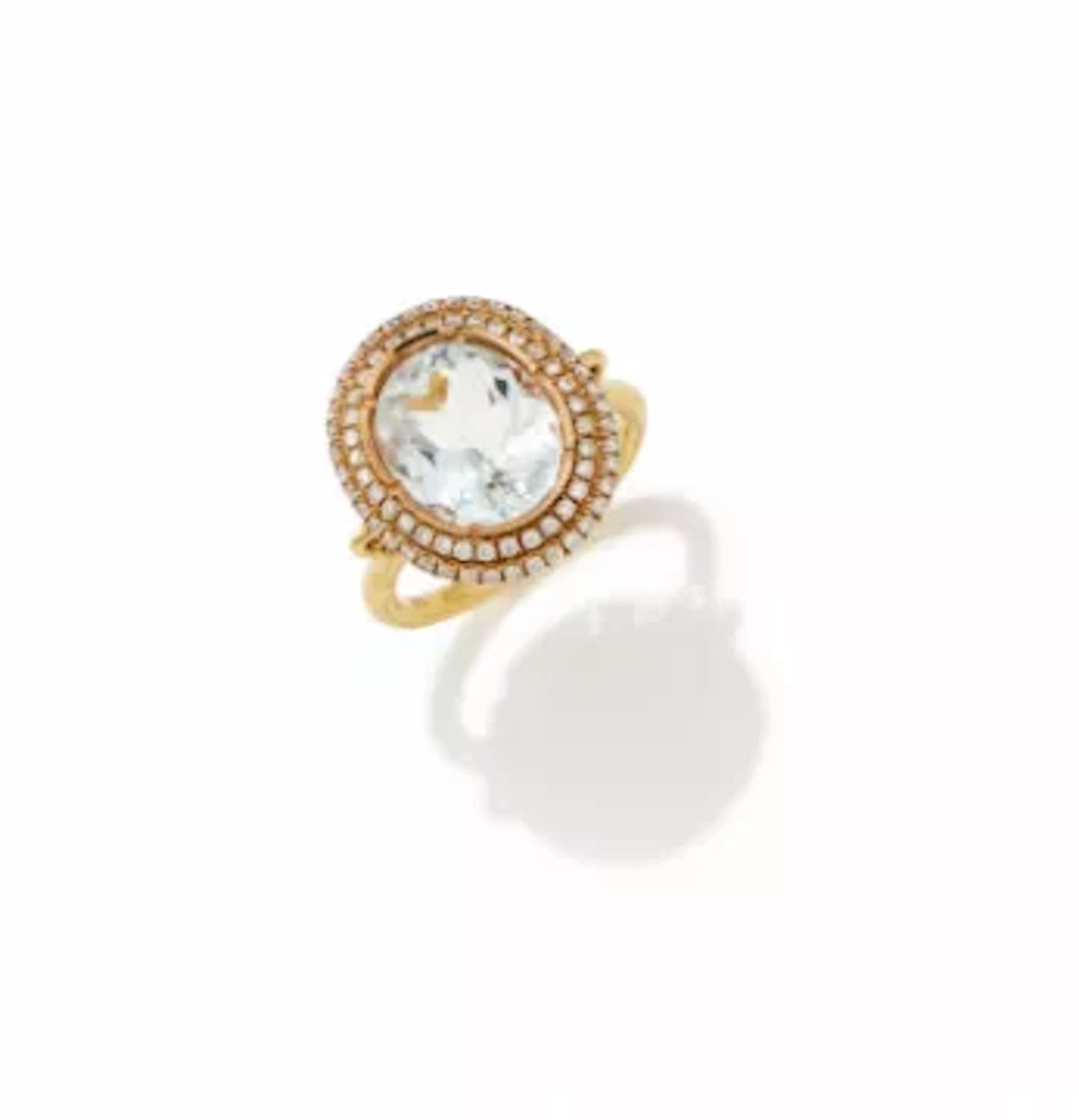 AN AQUAMARINE AND DIAMOND CLUSTER RING