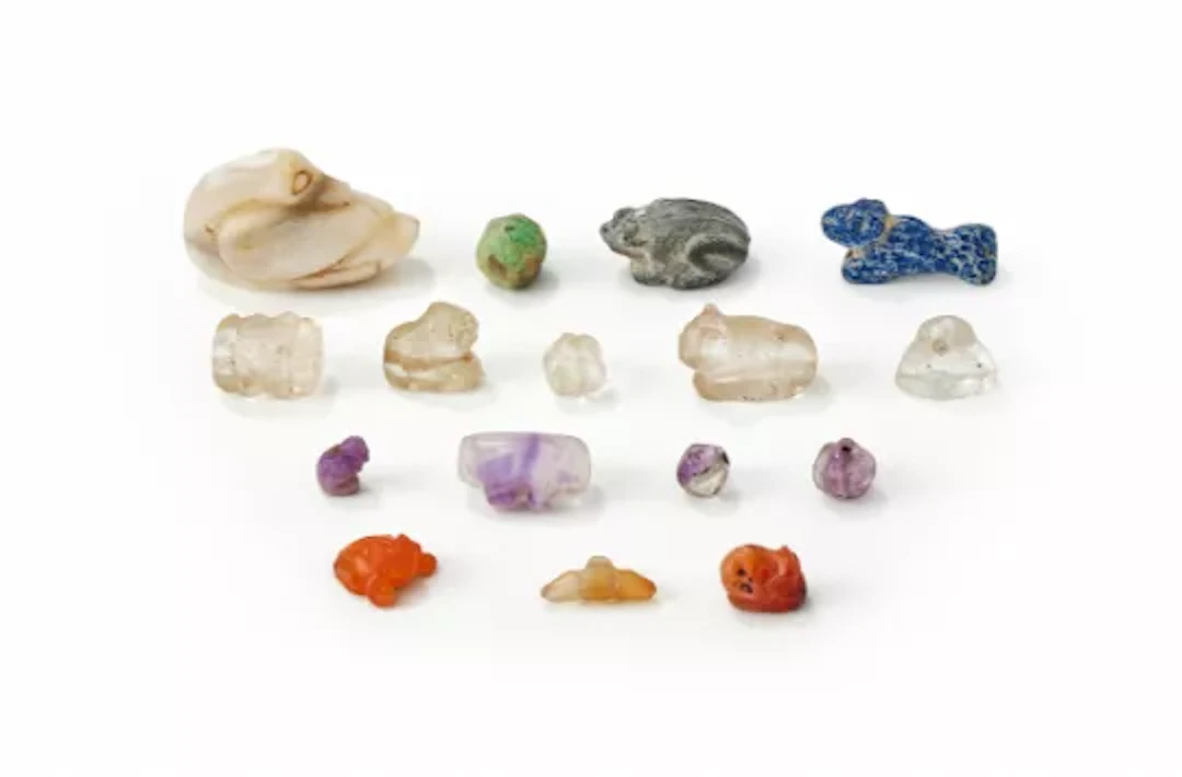 A group of small carved hardstone beads, 2nd century or earlier