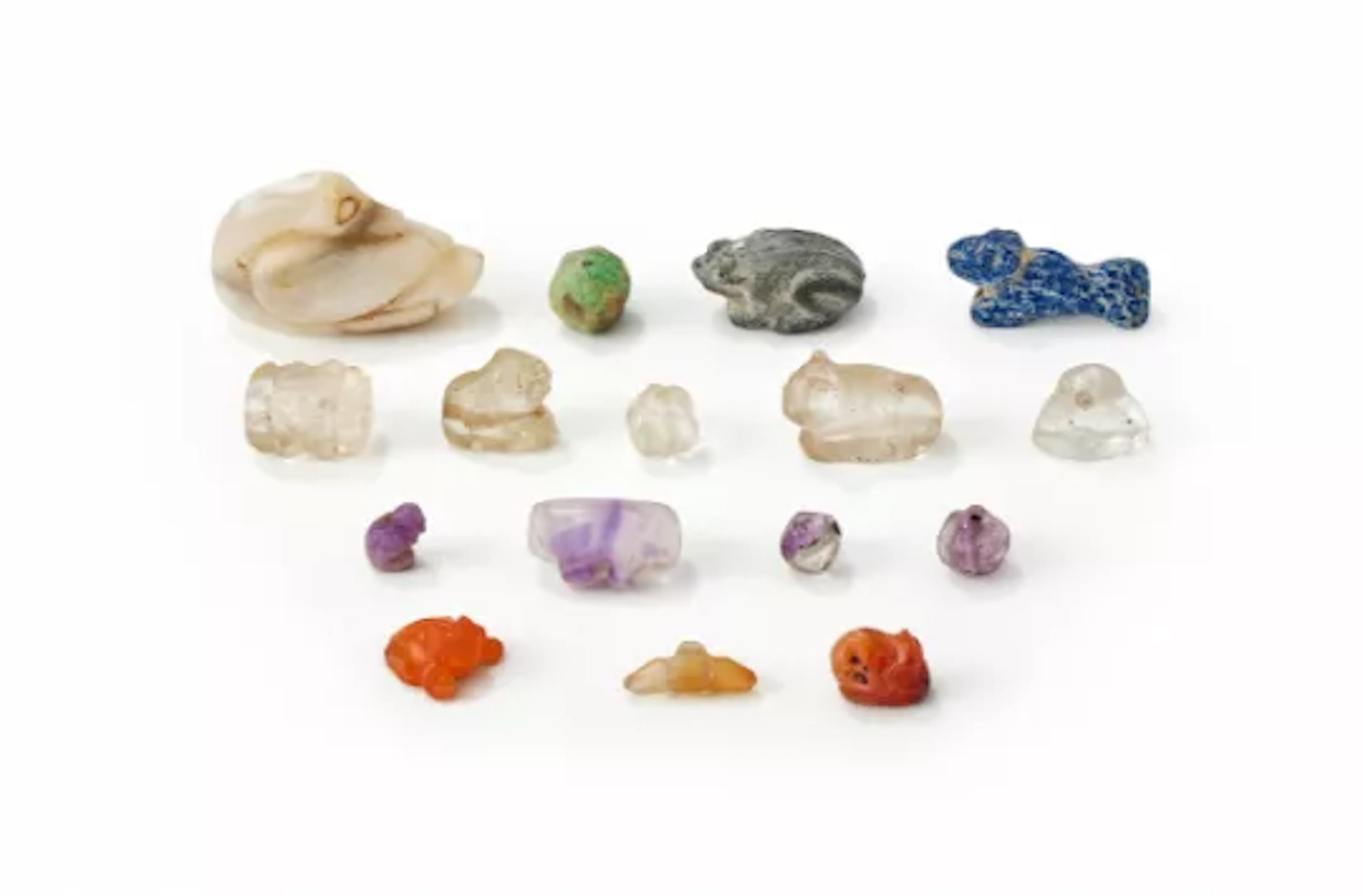 A group of small carved hardstone beads, 2nd century or earlier