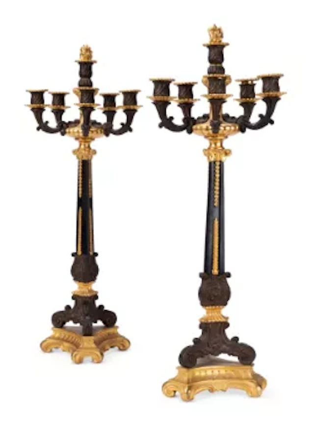 A PAIR OF GILT AND PATINATED BRONZE FIVE LIGHT CANDELABRA, FRENCH