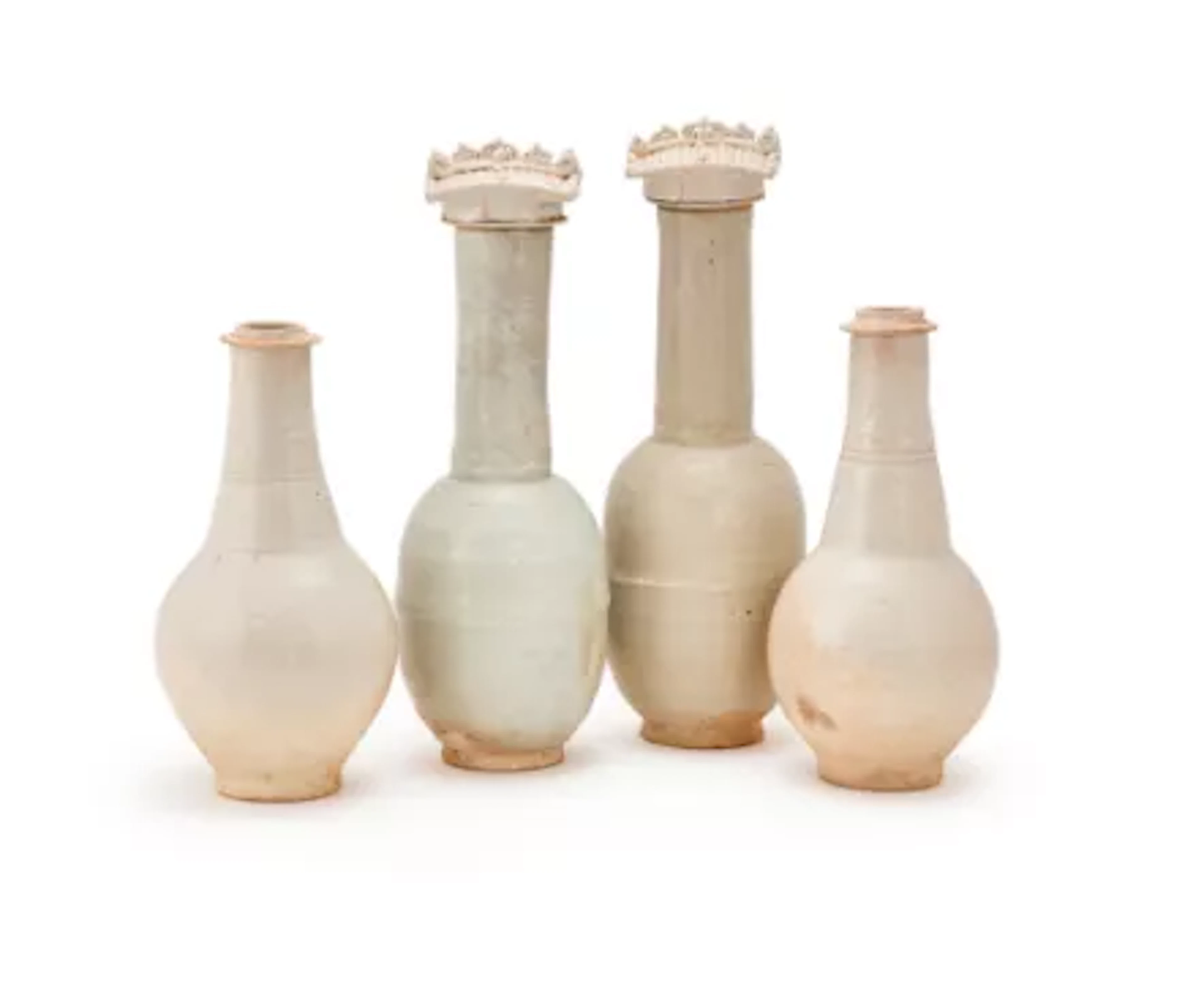 Two similar Chinese white glazed vases, Yuan dynasty (1271 to 1368 AD)
