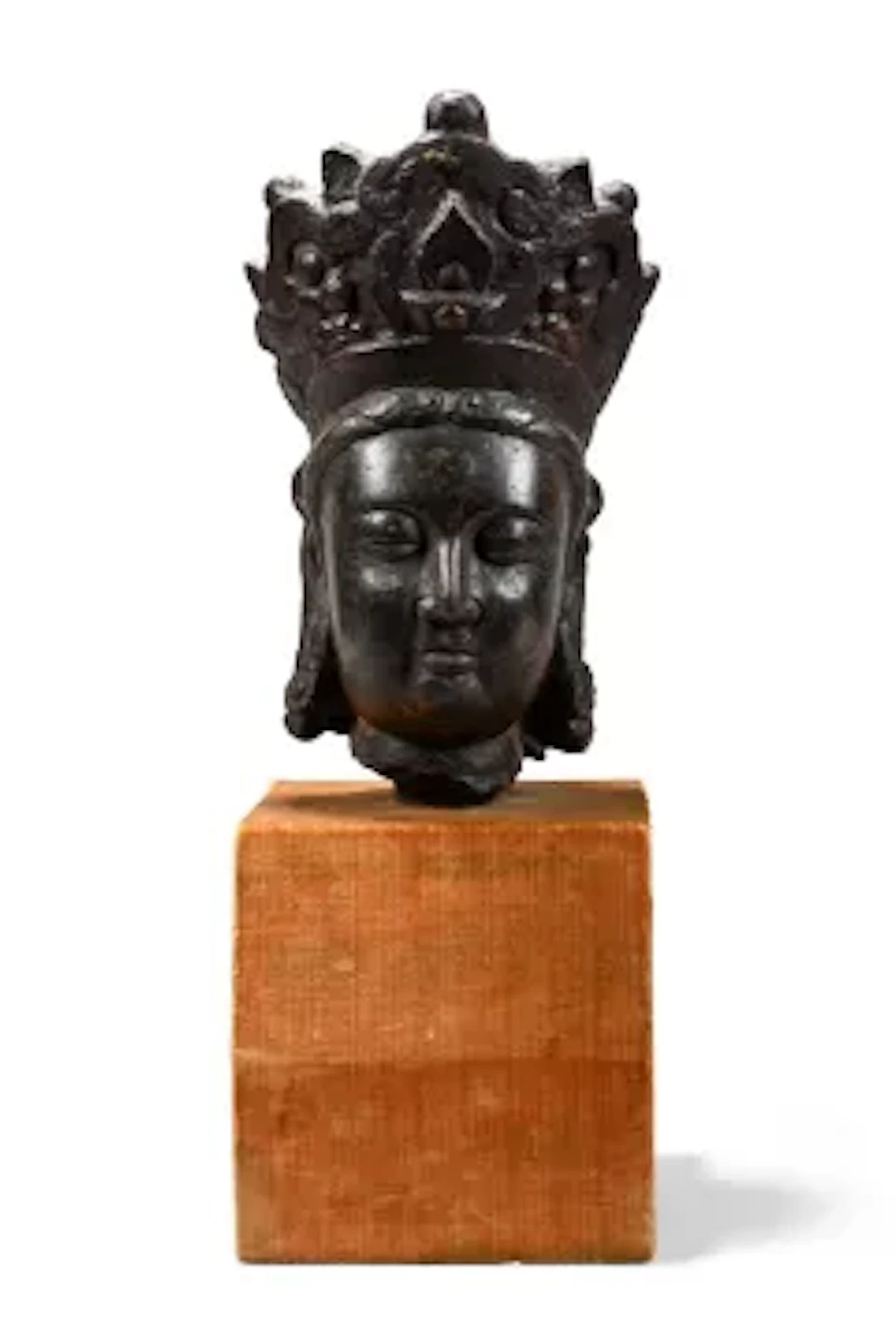 A carved and lacquered Chinese limestone Buddha head of Guanyin, Ming Dynasty