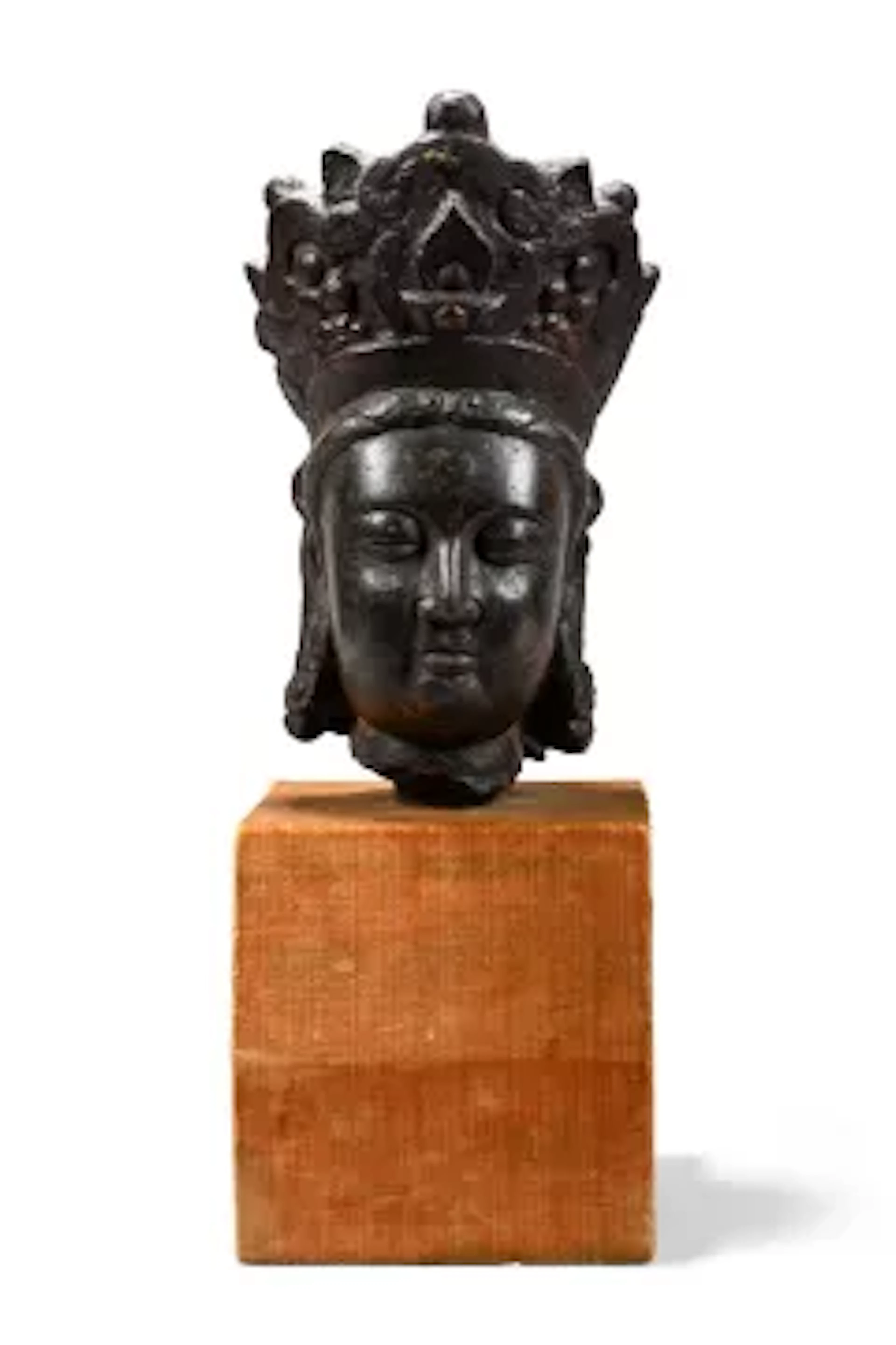 A carved and lacquered Chinese limestone Buddha head of Guanyin, Ming Dynasty