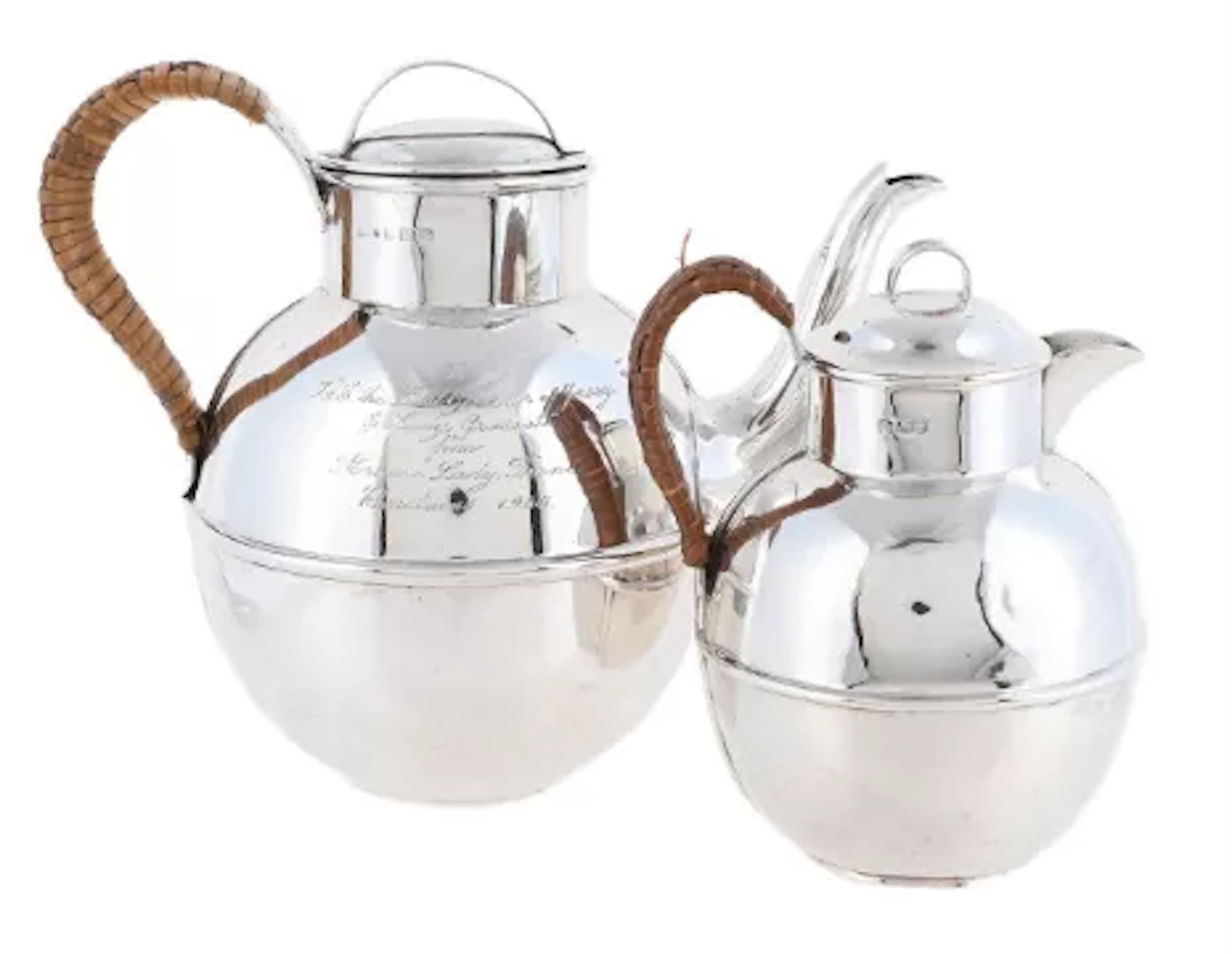 AN EDWARDIAN SILVER JERSEY CAN FORM TEA POT AND CREAM JUG
