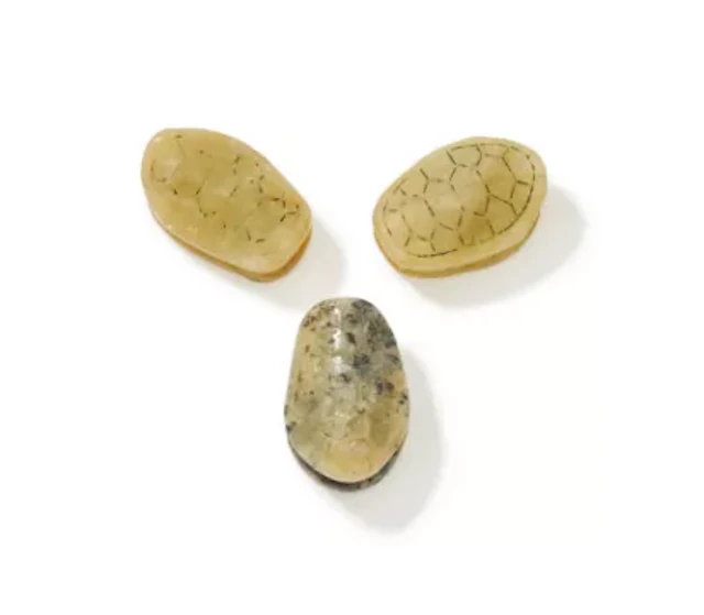 A group of three Chinese jade beads in the form of tortoise shells