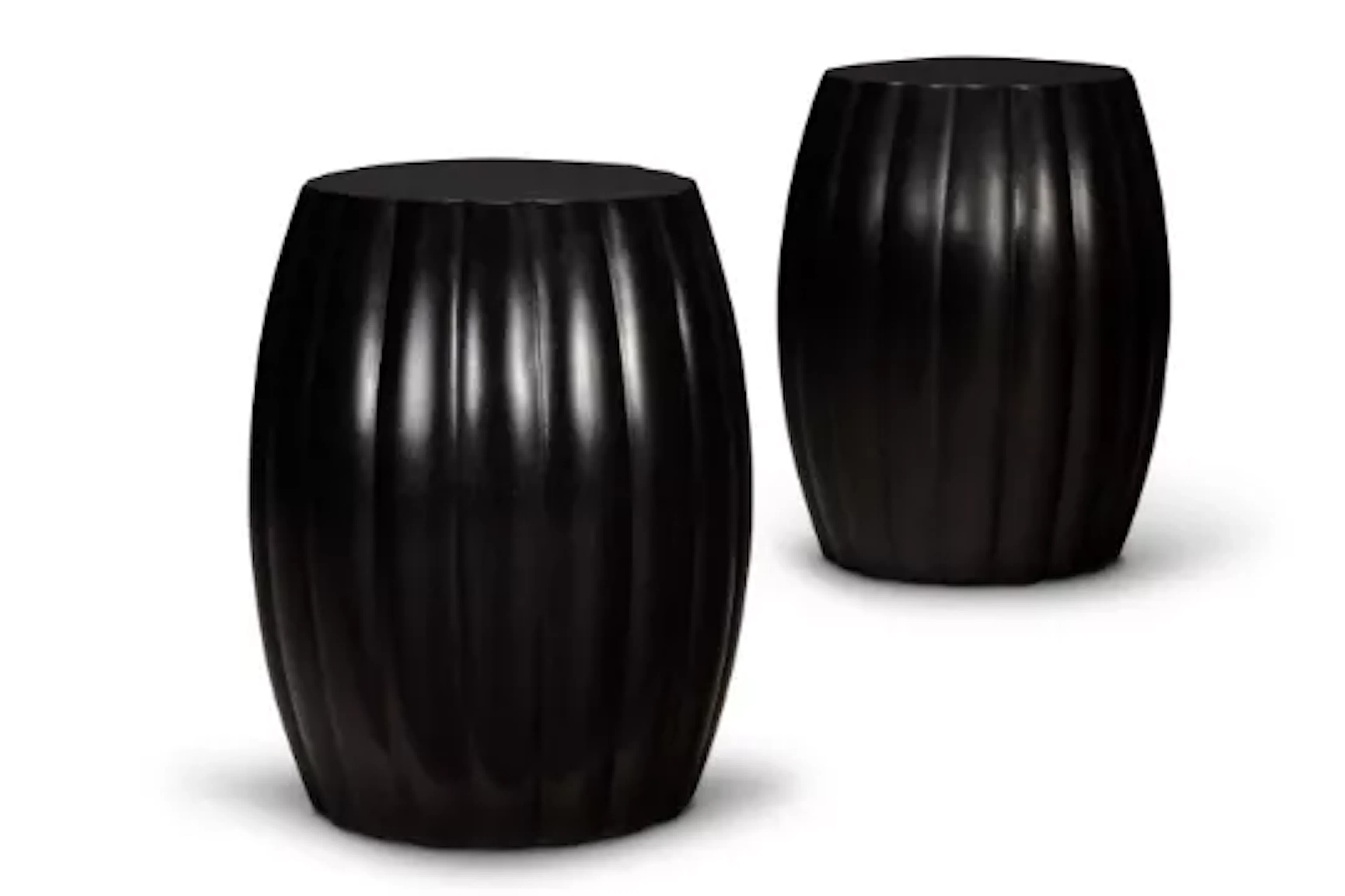 Y A PAIR OF EBONY GADROONED DRUM-SHAPED STOOLS, MODERN