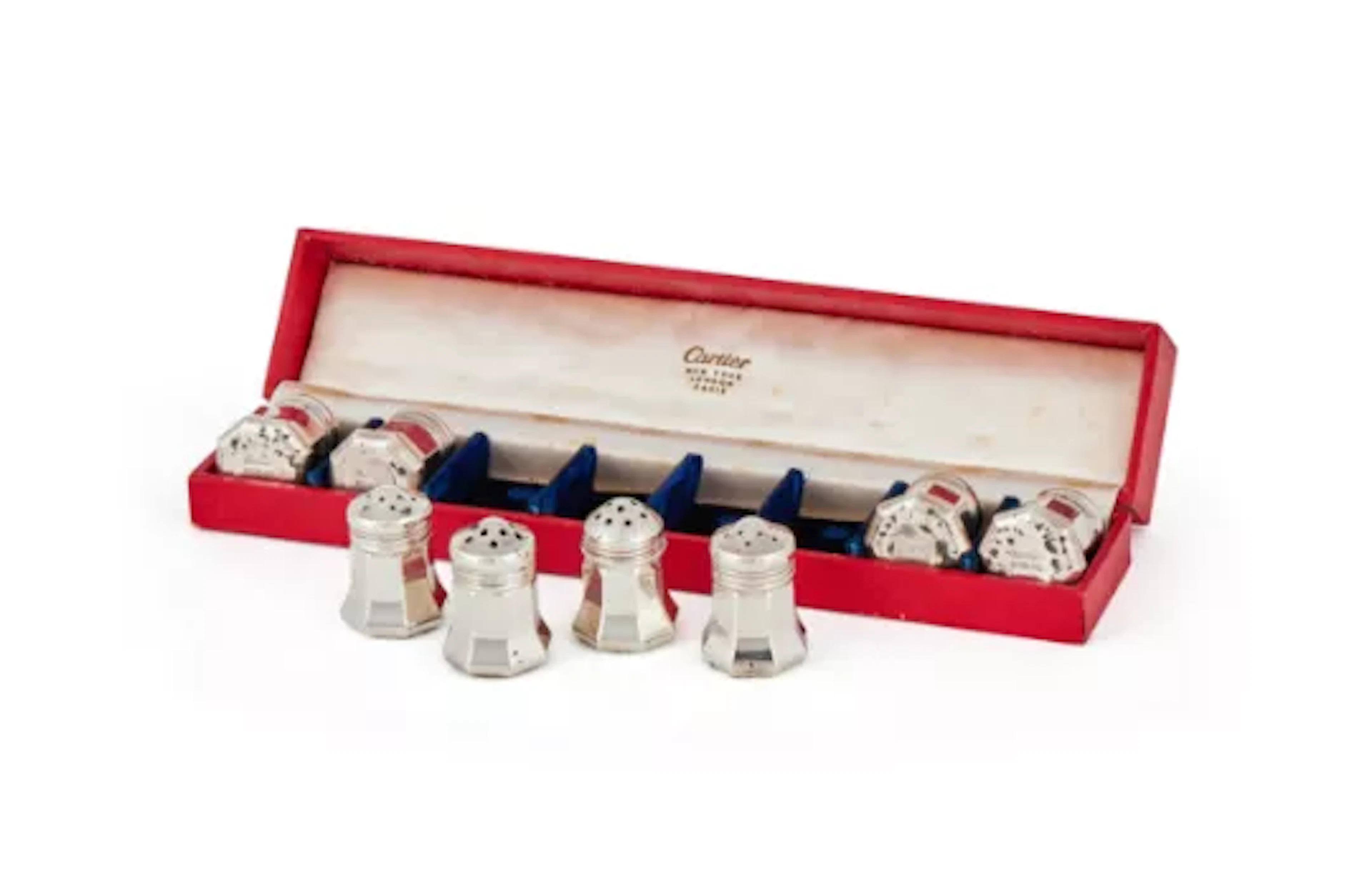 CARTIER, A CASED SET OF EIGHT AMERICAN SILVER SALT AND PEPPER SHAKERS