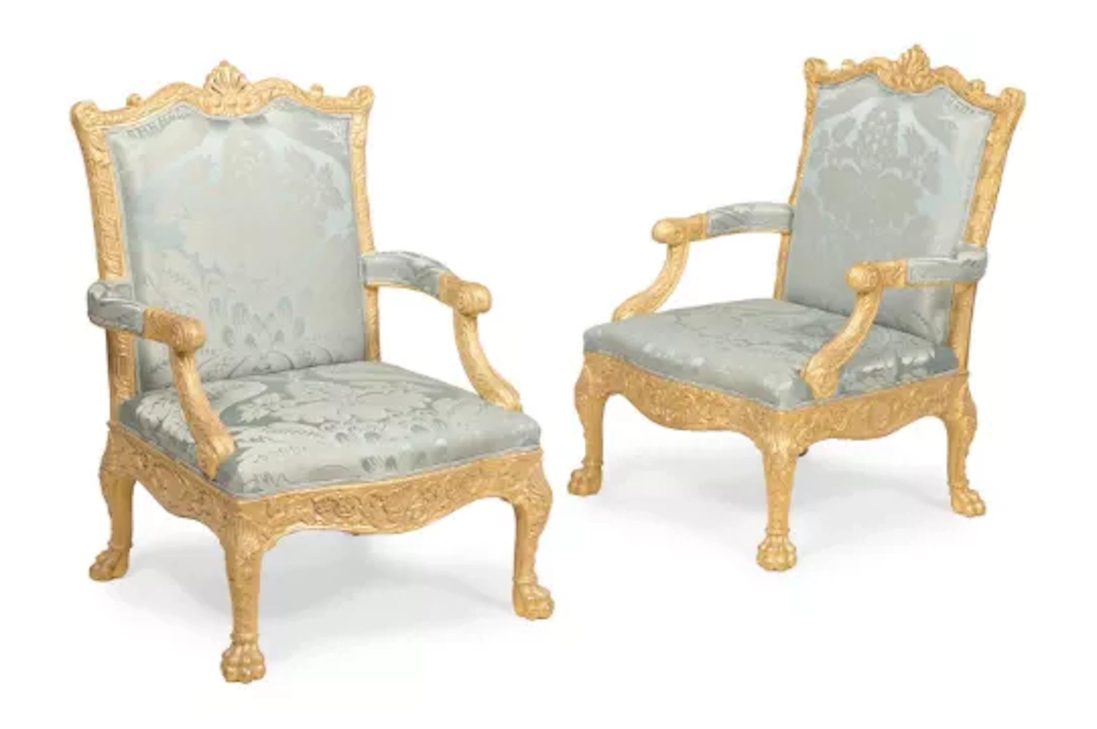 A PAIR OF CARVED GILTWOOD AND UPHOLSTERED LIBRARY ARMCHAIRS, IN GEORGE