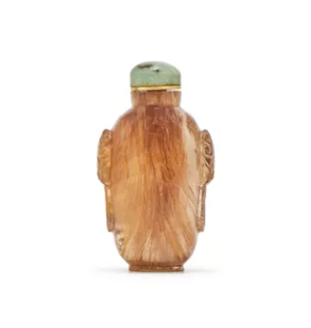 A Chinese golden 'hair' crystal snuff bottle and stopper, 19th or 20th century