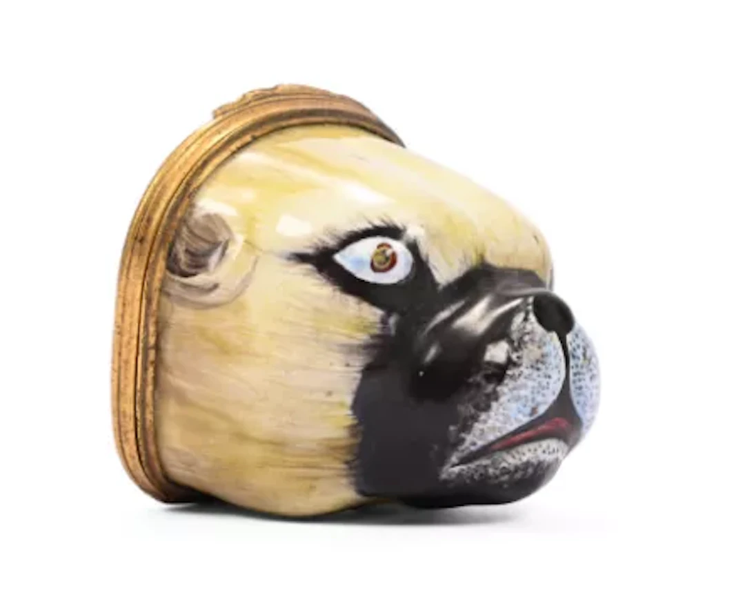 AN ENAMEL PUG DOG MASK, SNUFF BOX OR BONBONNIERE, PROBABLY SOUTH STAFFORDSHIRE