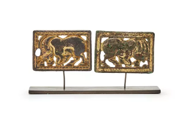 A pair of Chinese gilt bronze belt plaques, North China, 3rd-2nd century BC