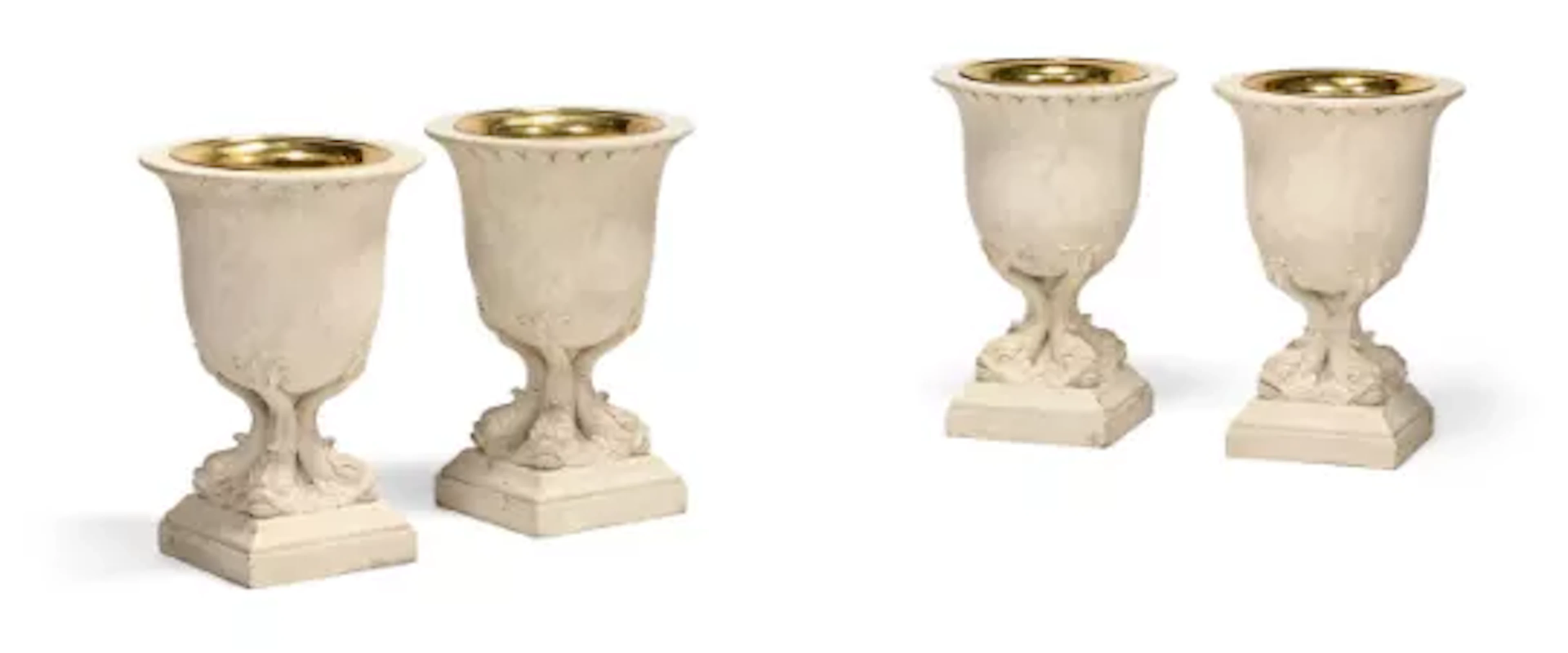 A SET OF FOUR CARVED WOOD AND GESSO PAINTED URNS OR PLANTERS, CONTEMPORARY