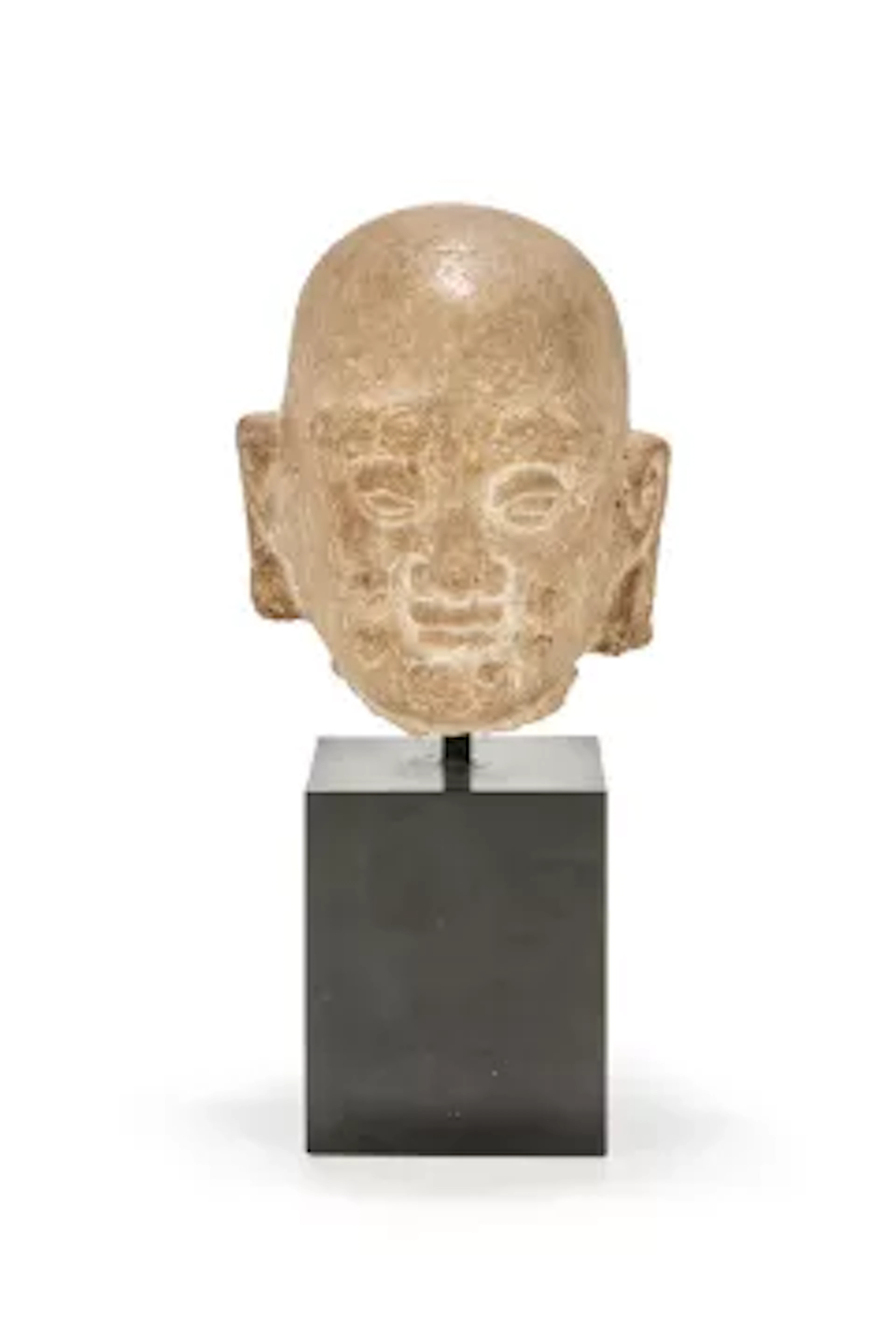 A Chinese carved stone head of a Luohan, Song-Yuan dynasty