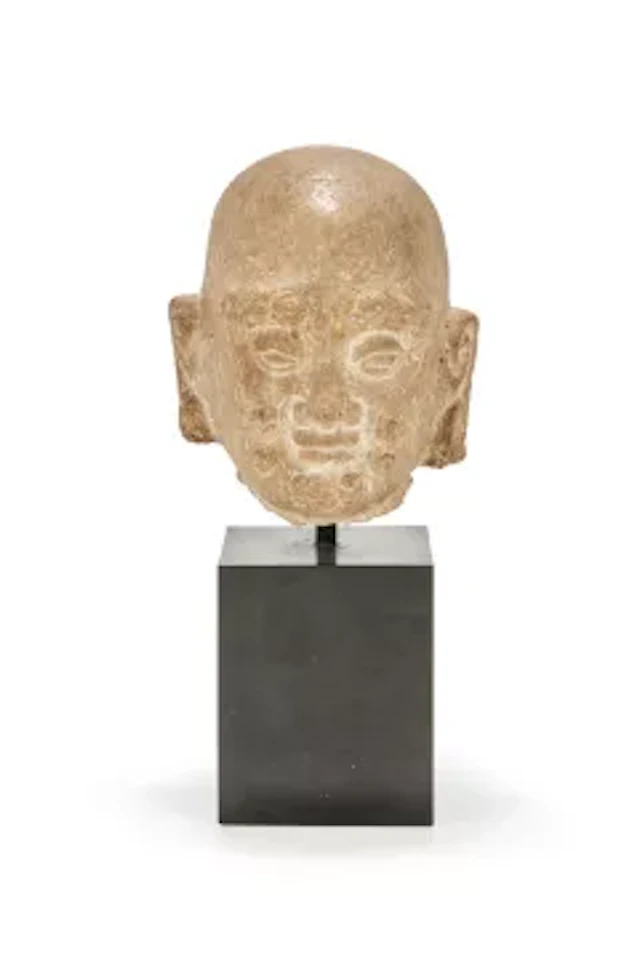 A Chinese carved stone head of a Luohan, Song-Yuan dynasty