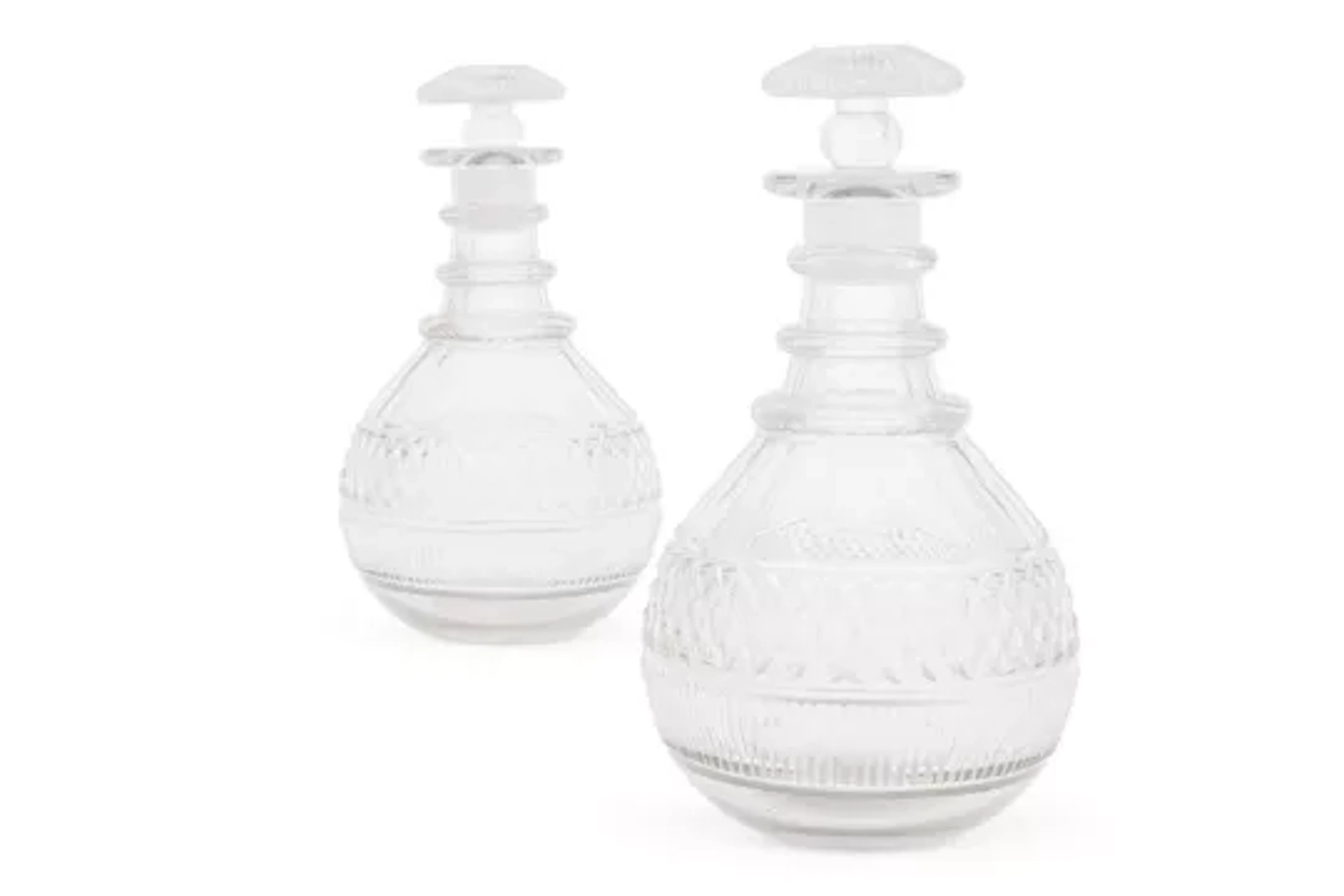 A PAIR OF CUT-GLASS CLUB-SHAPED DECANTERS AND STOPPERS, CIRCA 1825